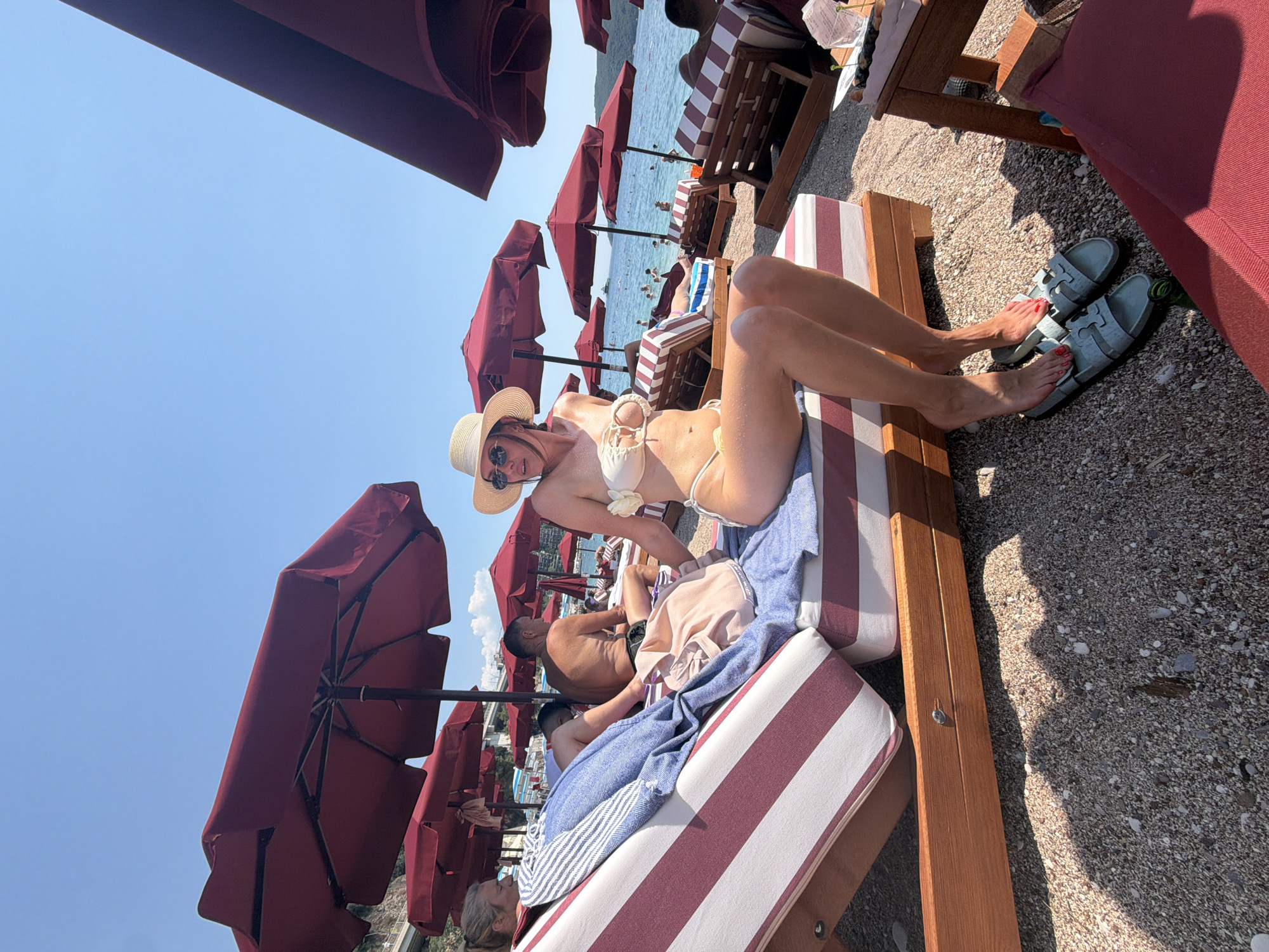 Midday beach scene on Budva's pebble shore, Adriatic coast