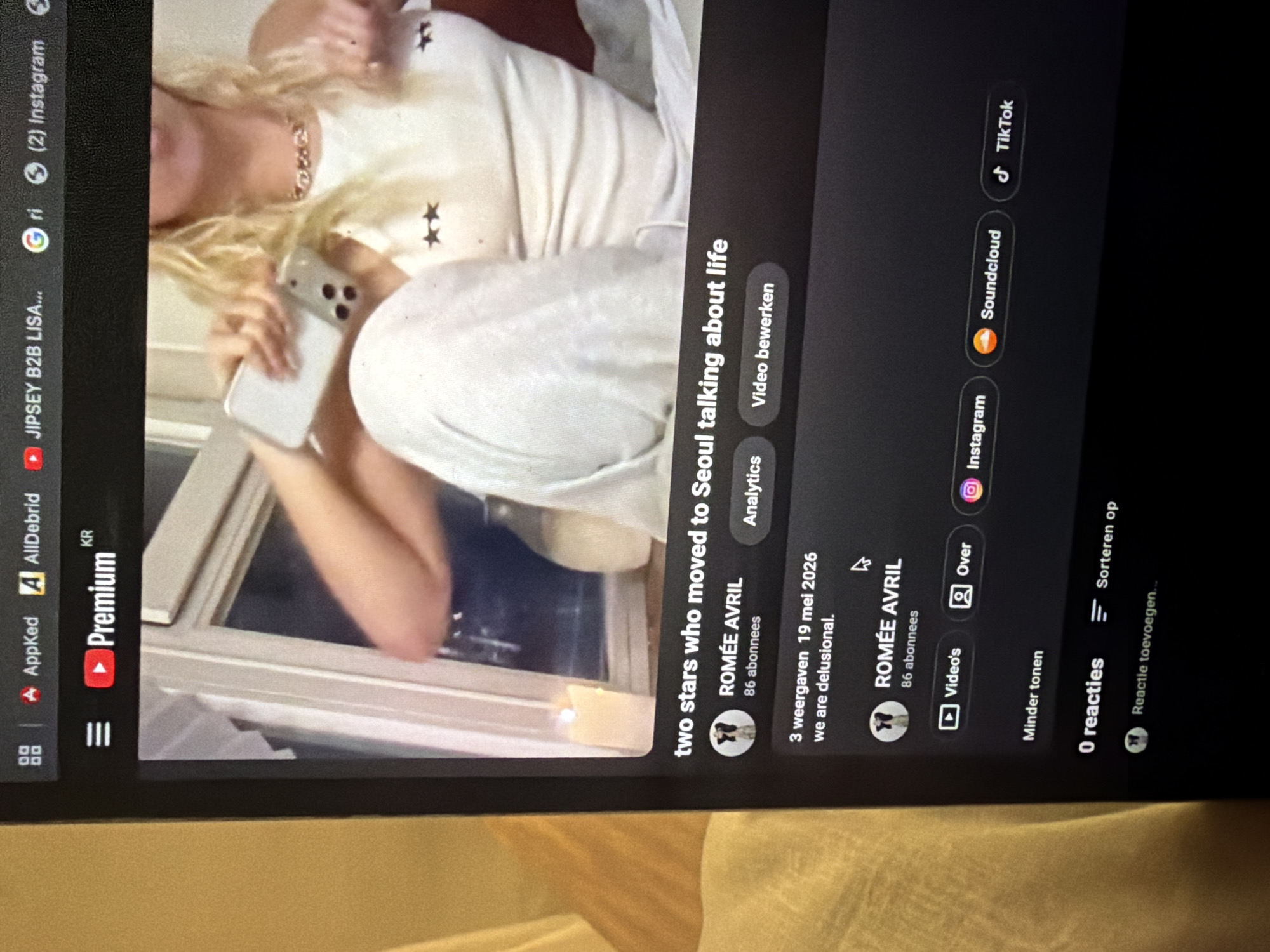Seoul resident watches YouTube video about expatriate life