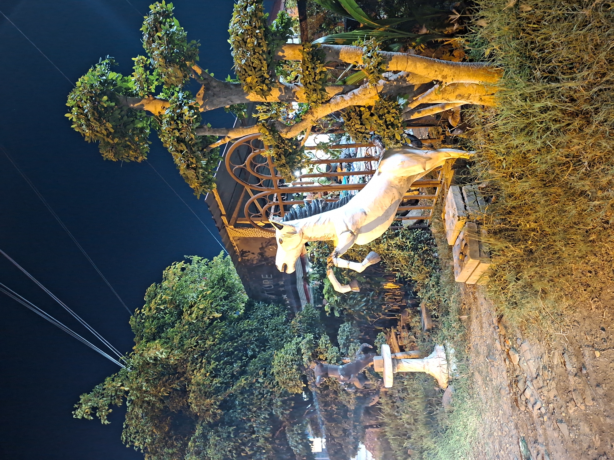Nighttime statuary and infrastructure documented in Lhokseumawe, Indonesia