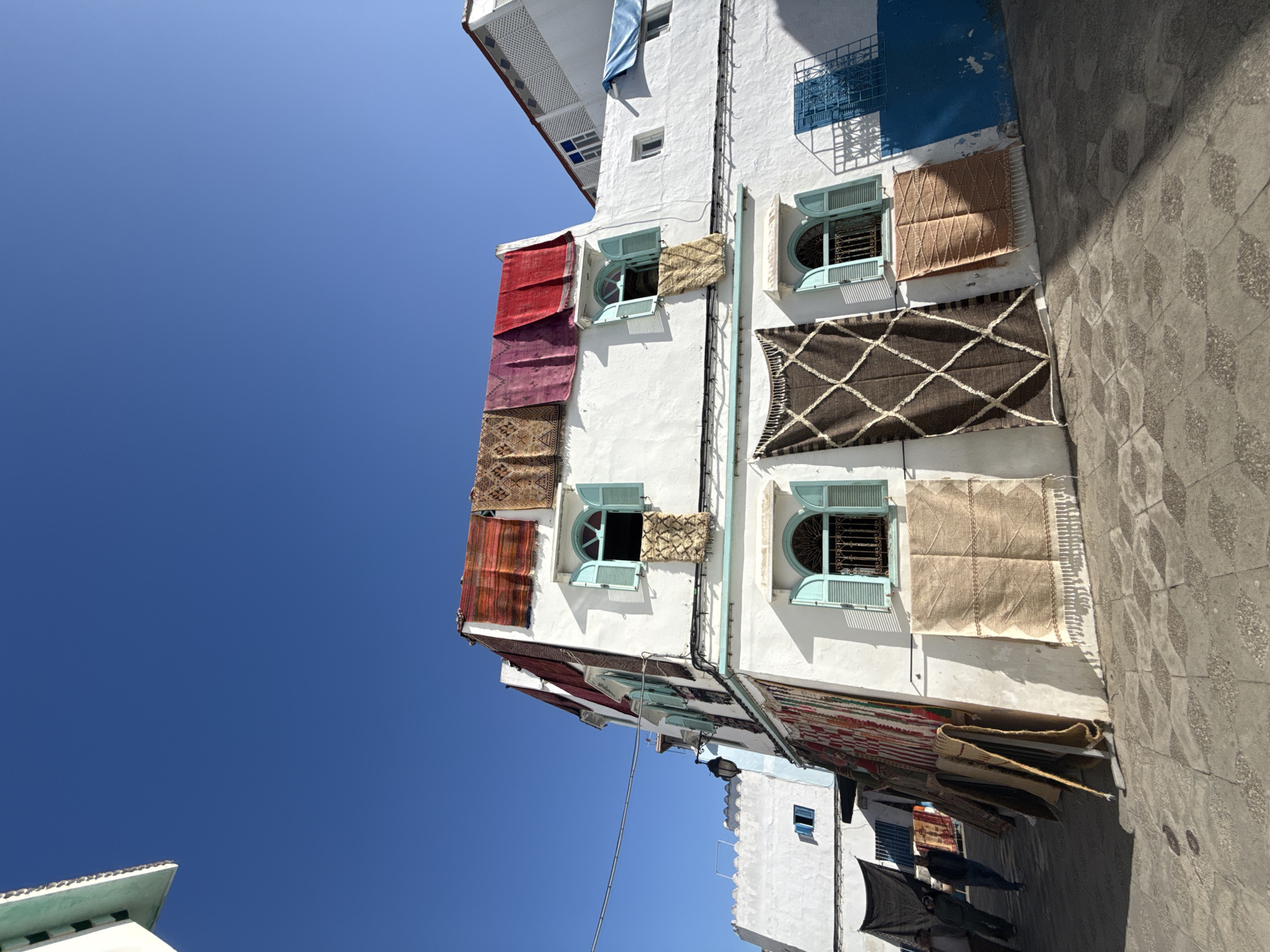 Street scene documented in Asilah showing traditional architecture