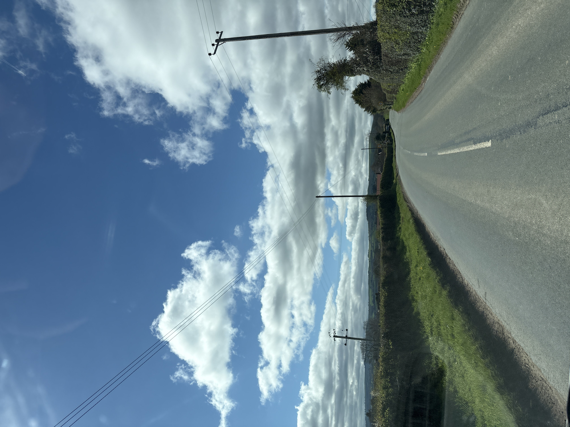 Rural road with hedgerows documented in Longden, UK