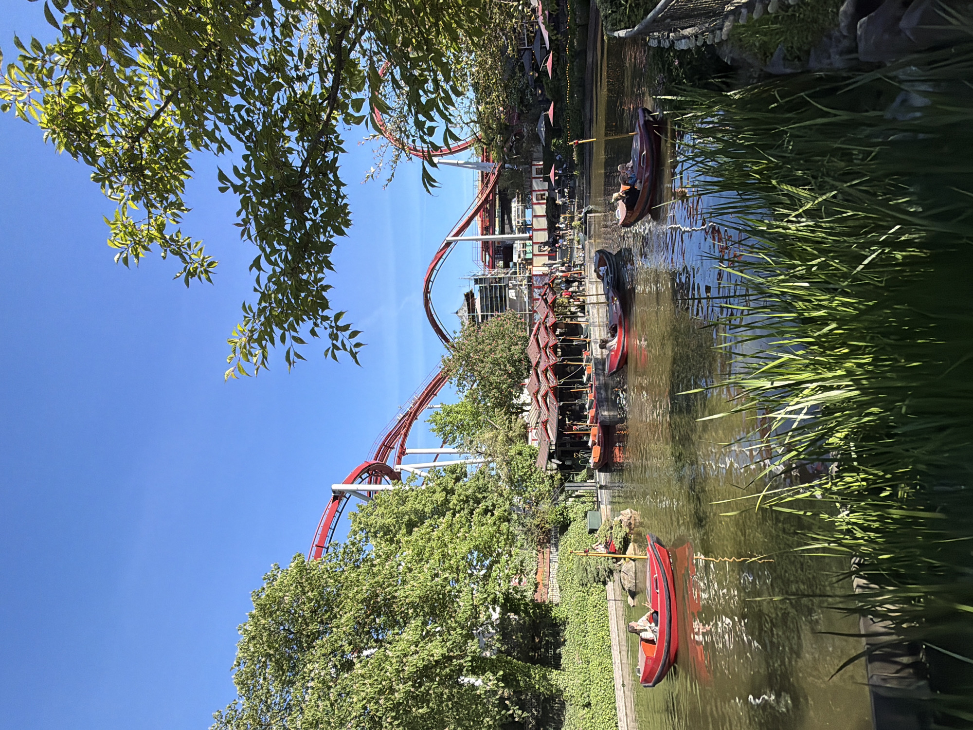 Afternoon visitors enjoy rides at Copenhagen's Tivoli Gardens