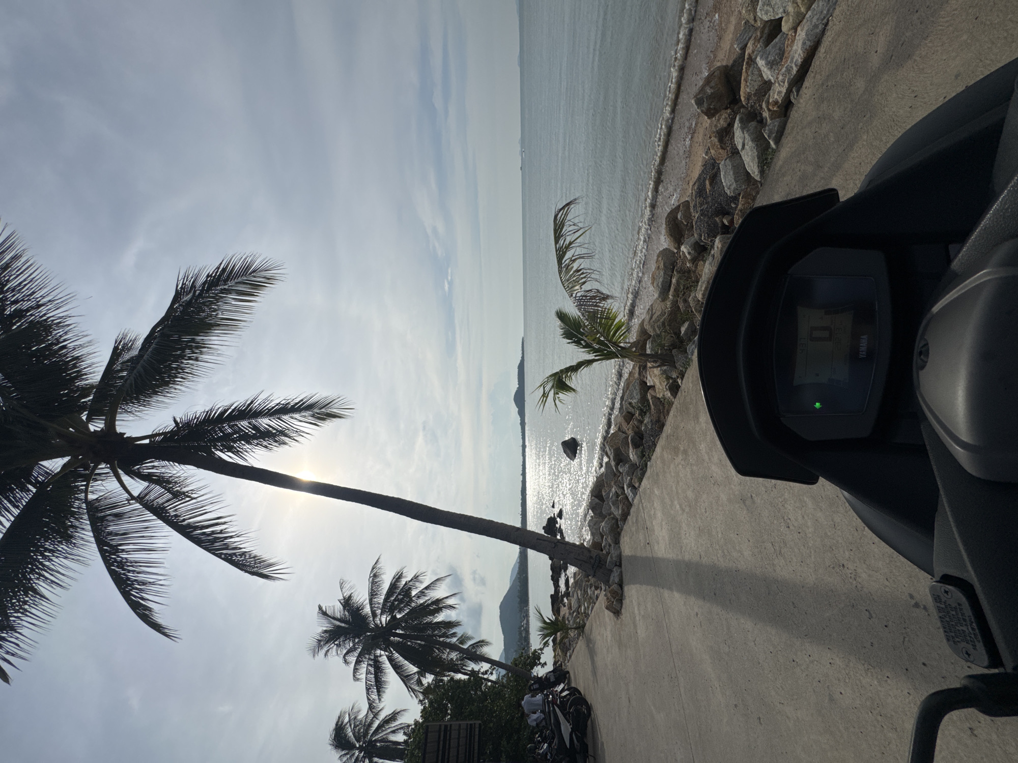 Scooter ride along Ko Samui's rocky coast, ending at a waterfront restaurant