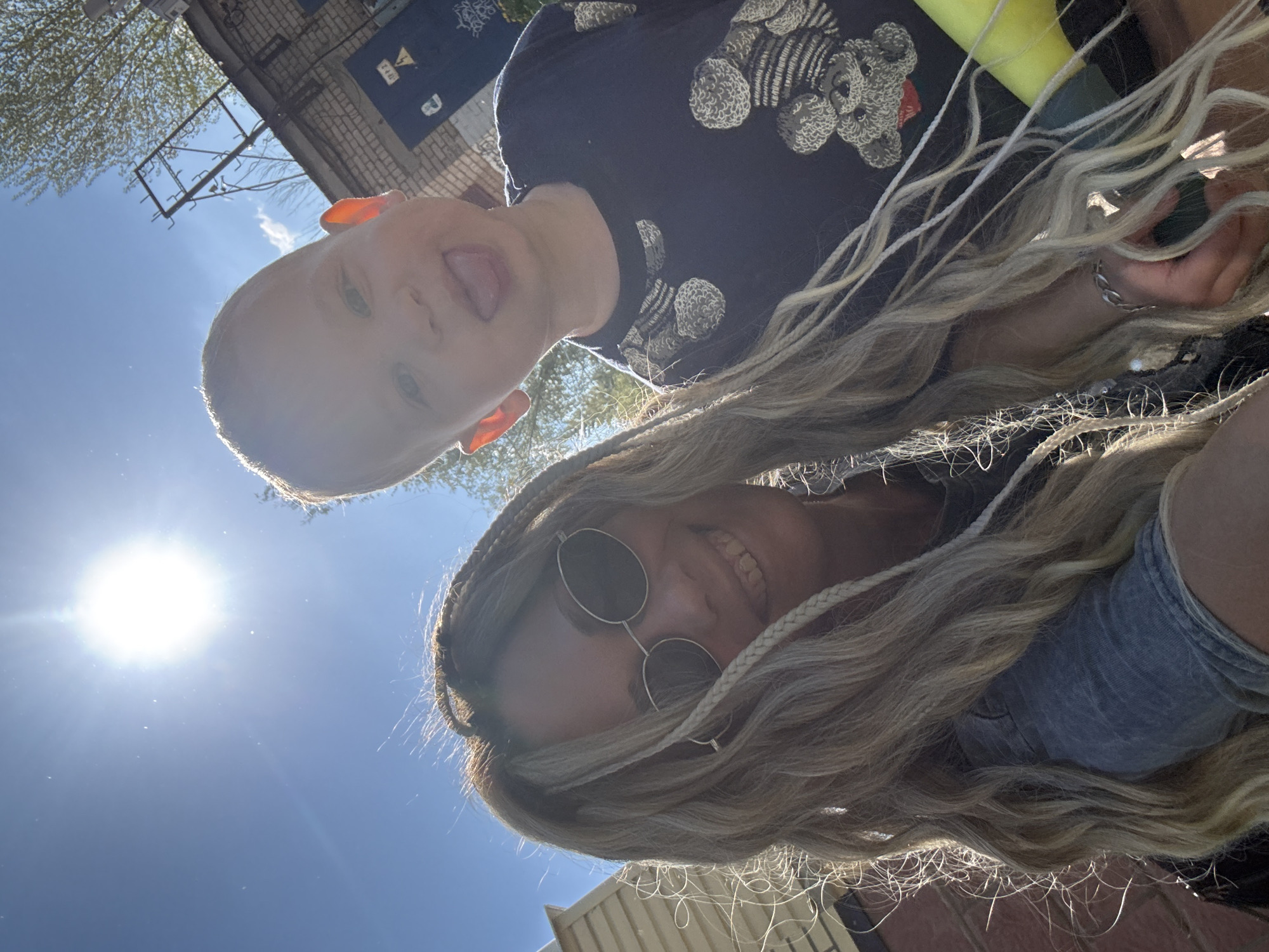 Family captures spring selfies among blooming trees in Rusanovo