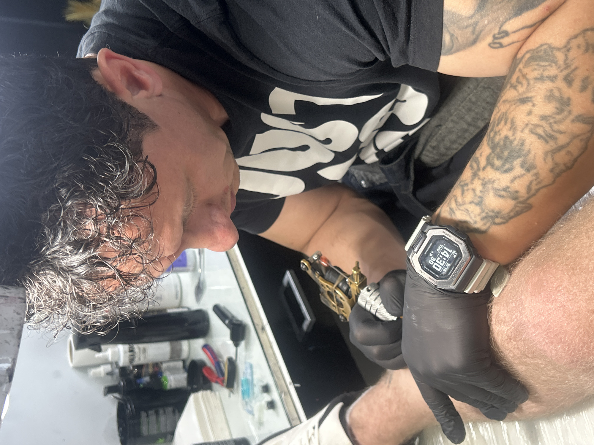 Tattoo session documented at Targovishte business