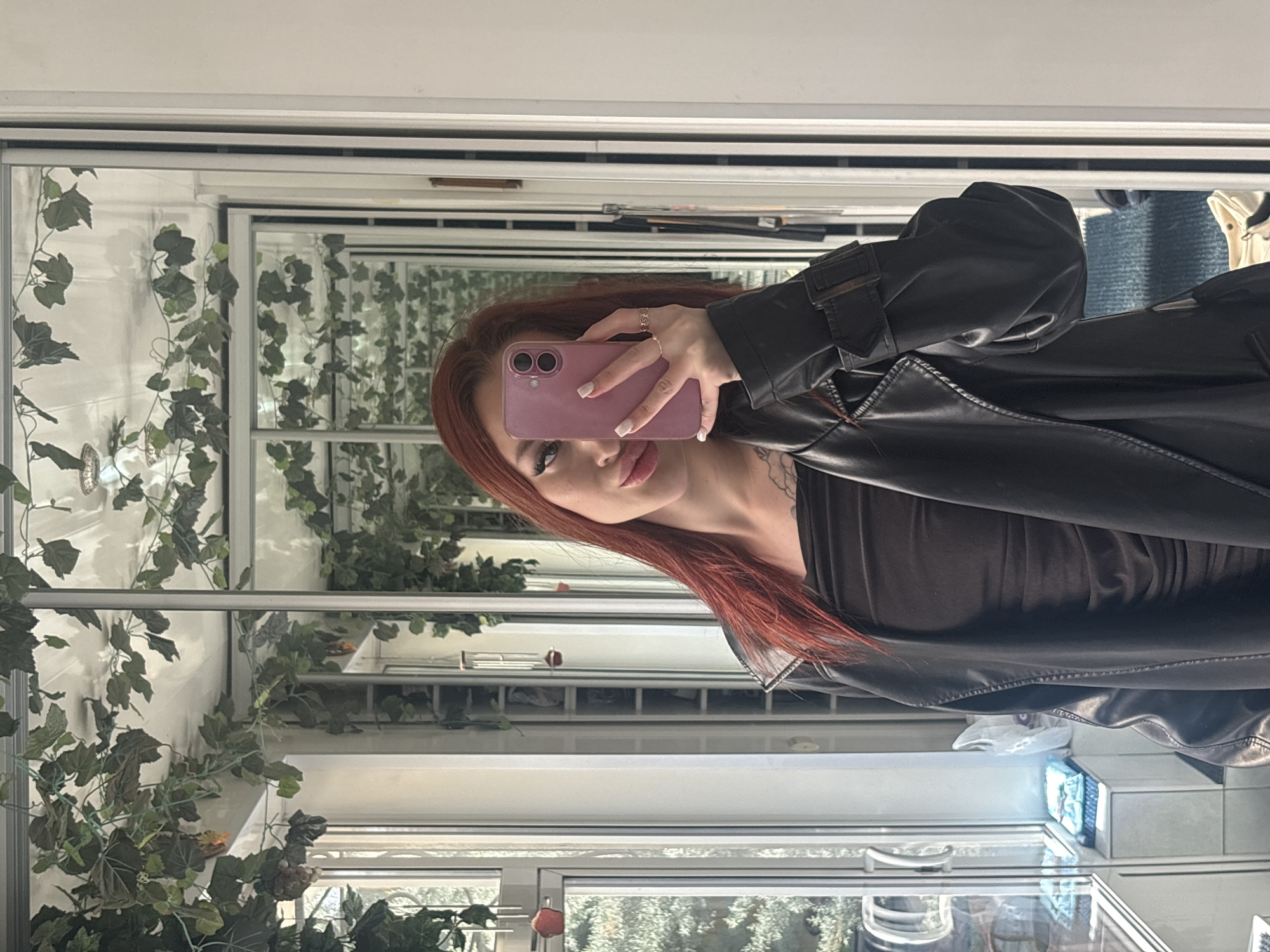 Woman conducts selfie session across multiple indoor locations in Simferopol