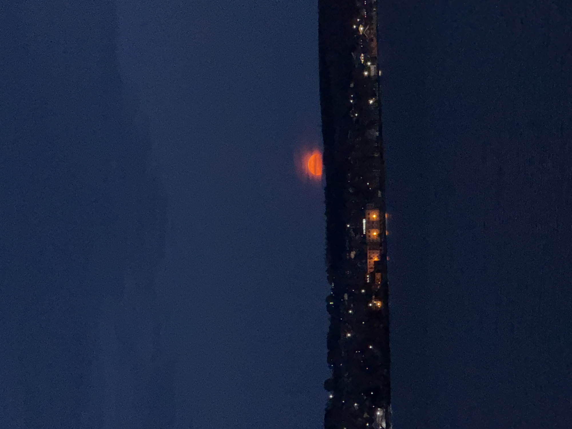 Orange glow illuminates night sky over Votkinsk, Russia