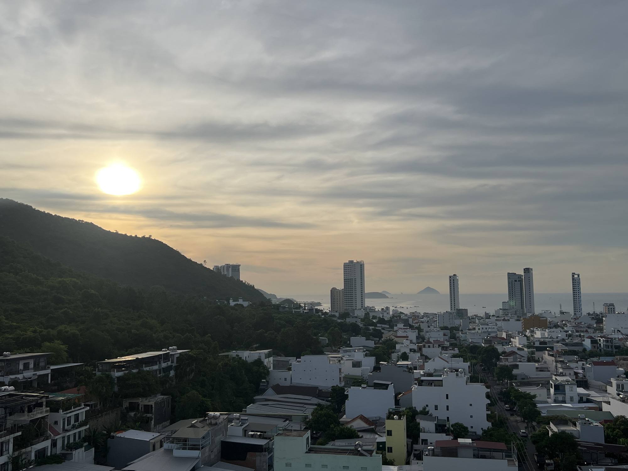Sunset panoramas over Nha Trang's coastline from a hillside viewpoint