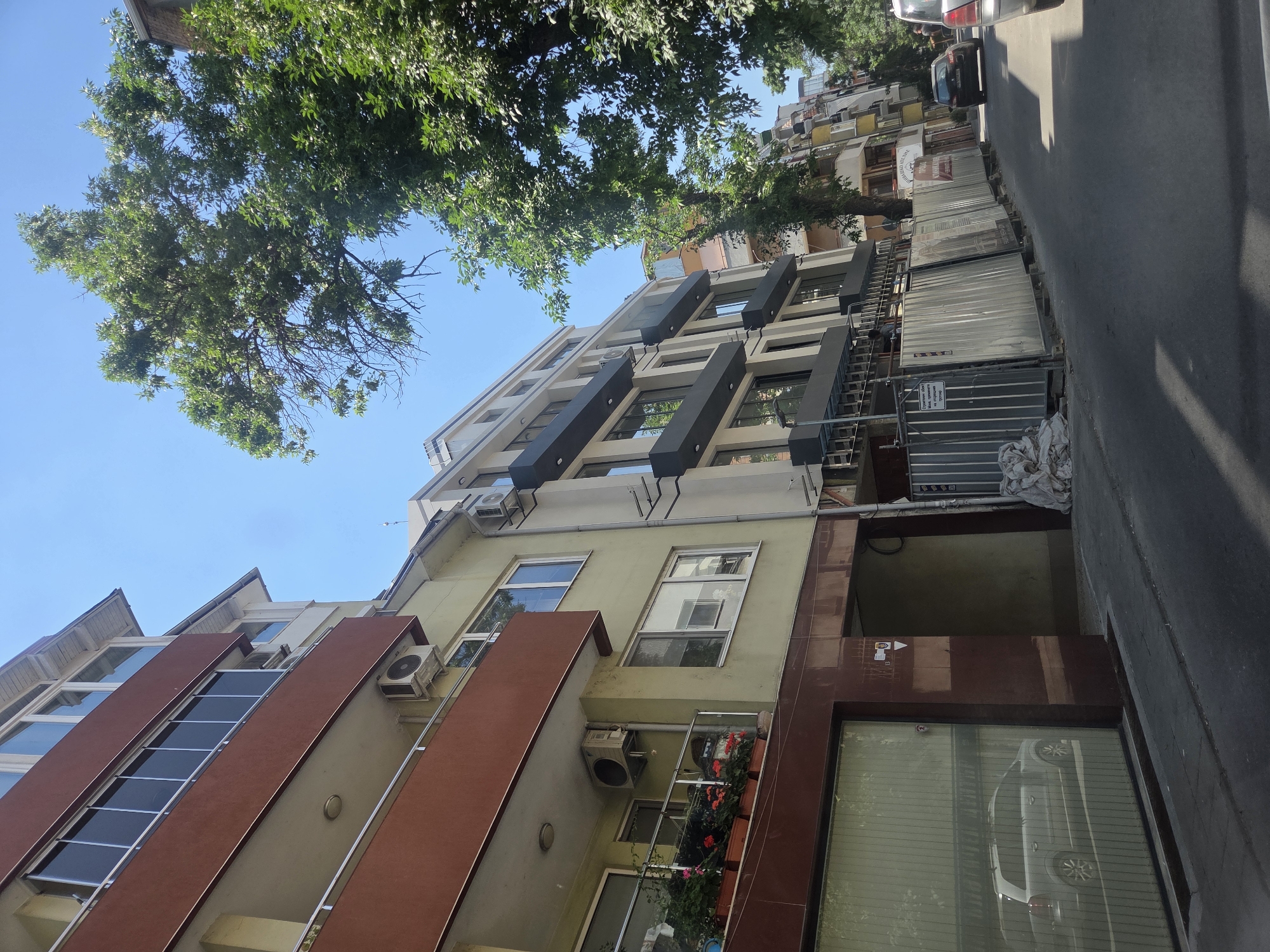 Red AMG GT parked on a sunny Plovdiv street