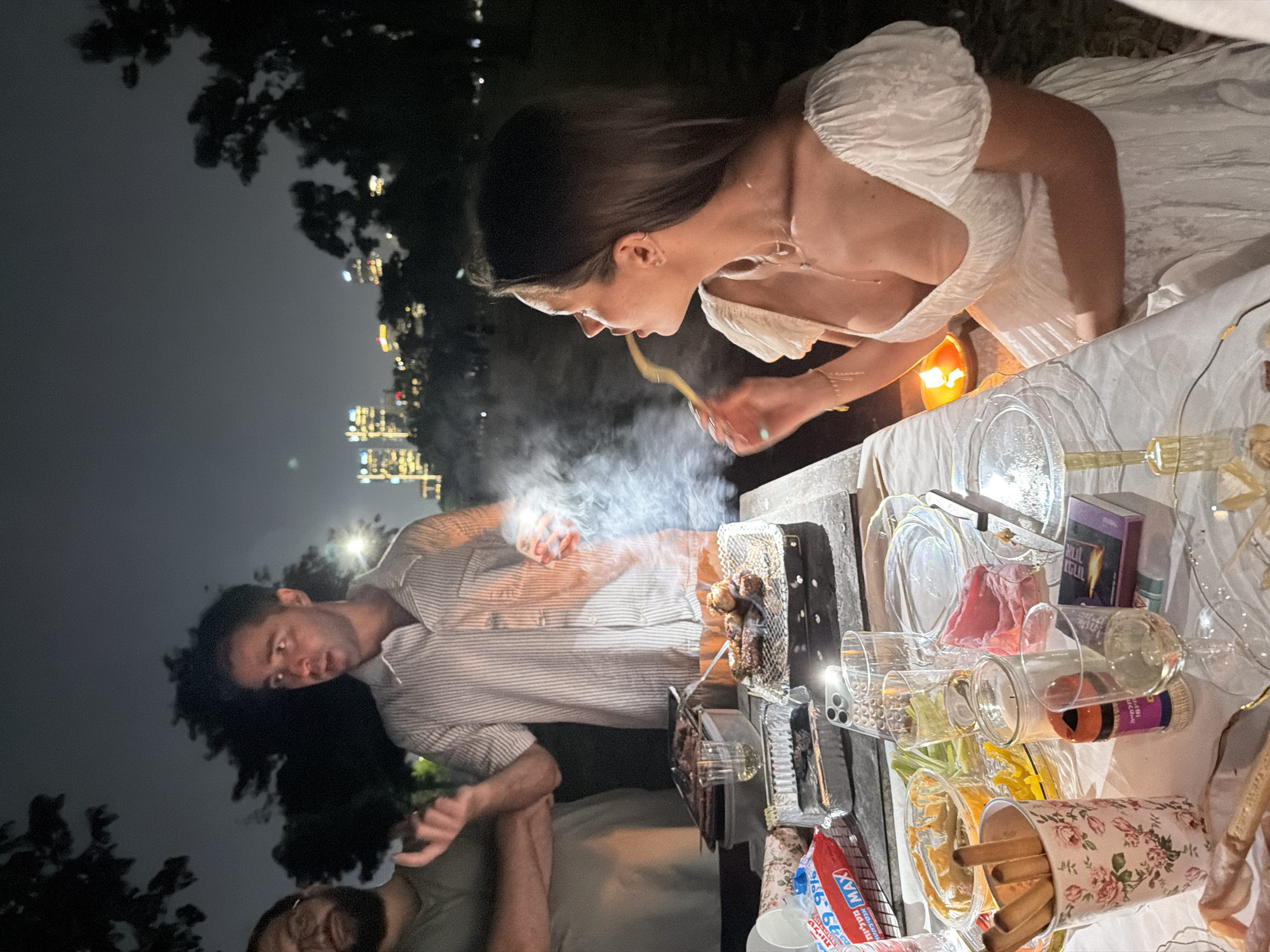 Evening picnic and grill session in Tel Aviv's Hayarkon Park