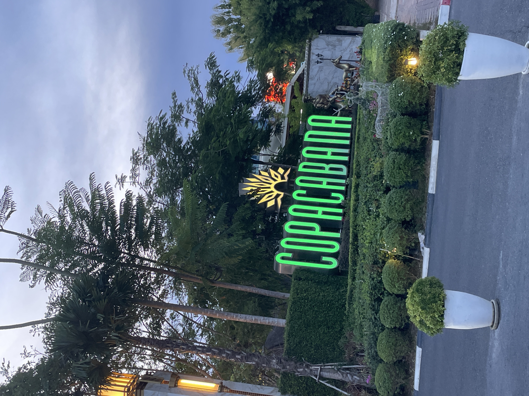 Pattaya's Ocean Drive complex lit up at dusk