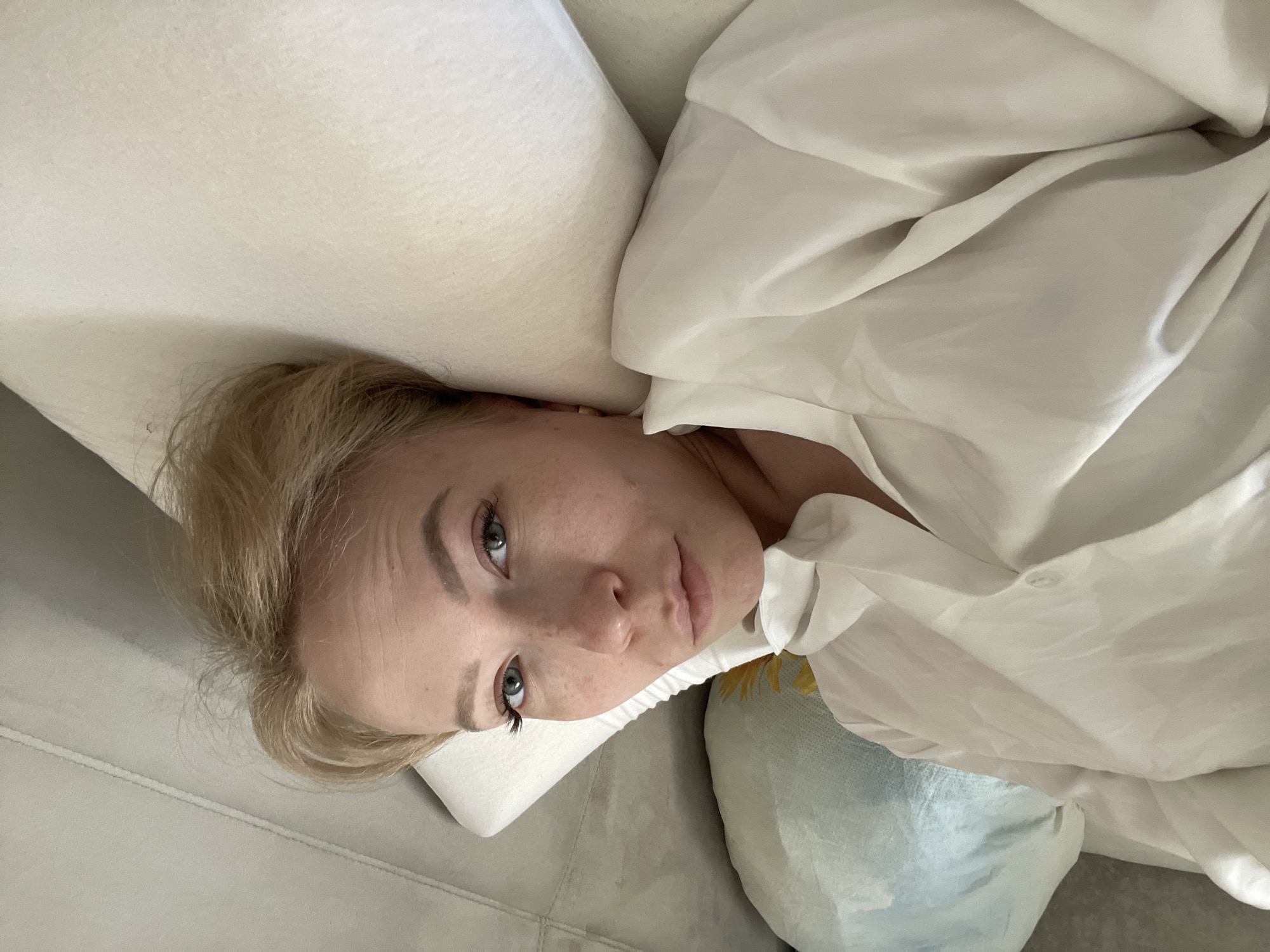 Woman photographed resting indoors in Perm, Russia