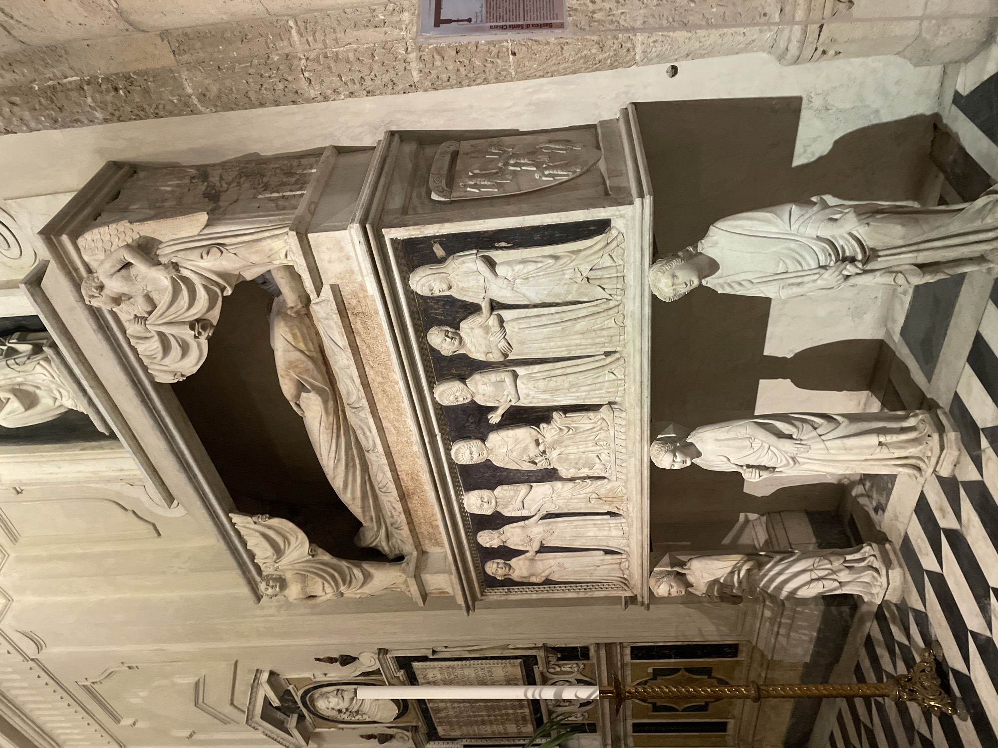 Tourist documents historic churches and religious sites in Naples