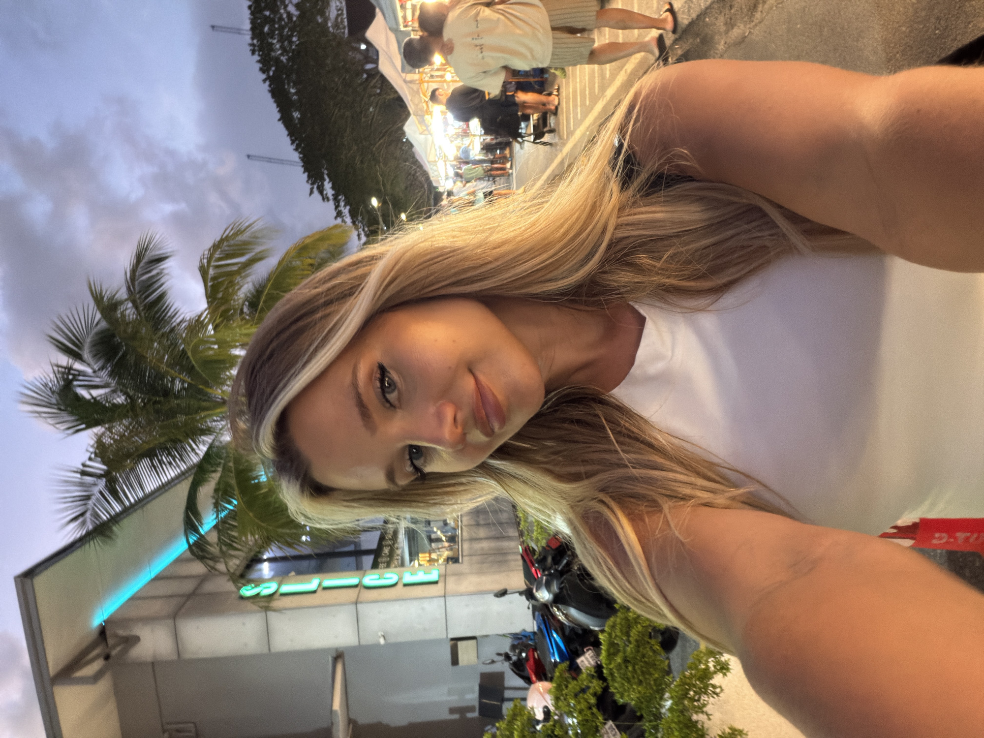 Selfie at a lit street market in Choeng Thale, Thailand