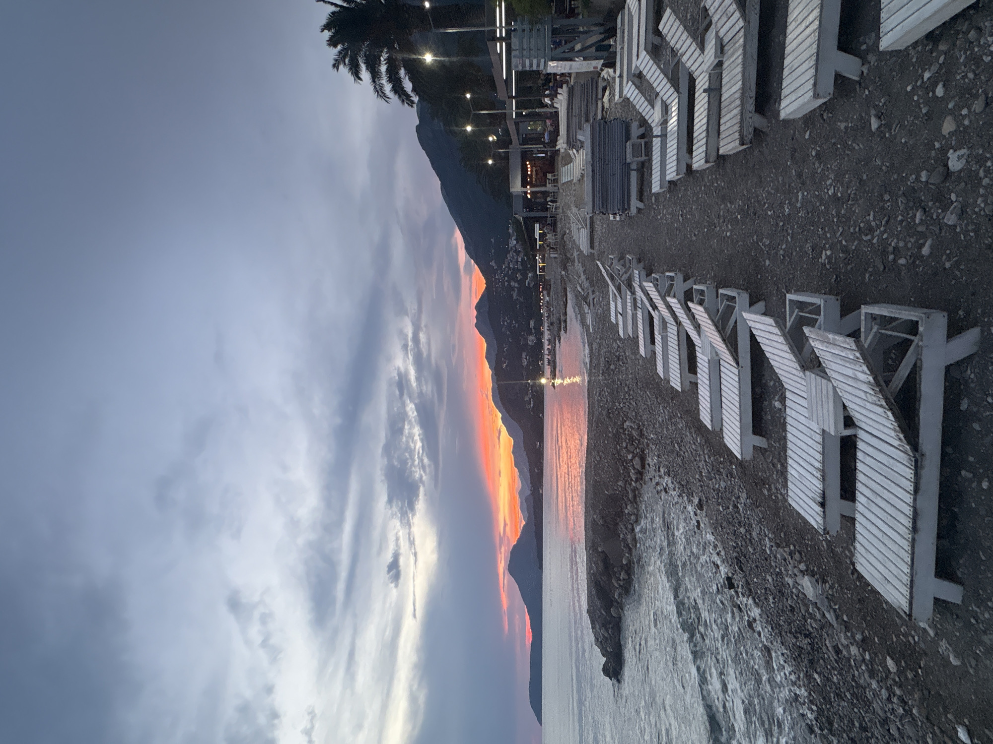 Sunset hours on a pebble beach in Bar, Montenegro