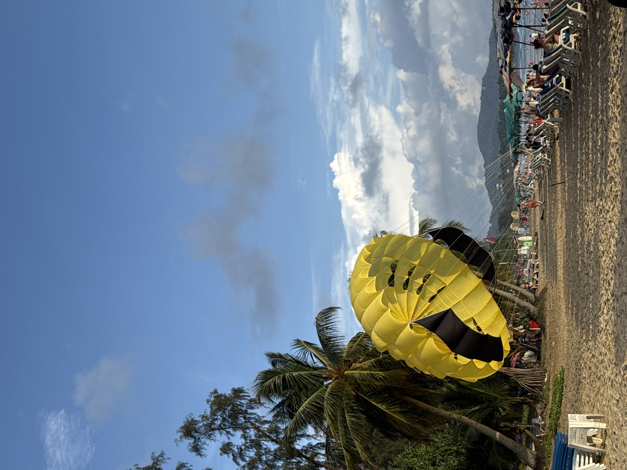 Karon Beach on a busy, flag-warned July morning