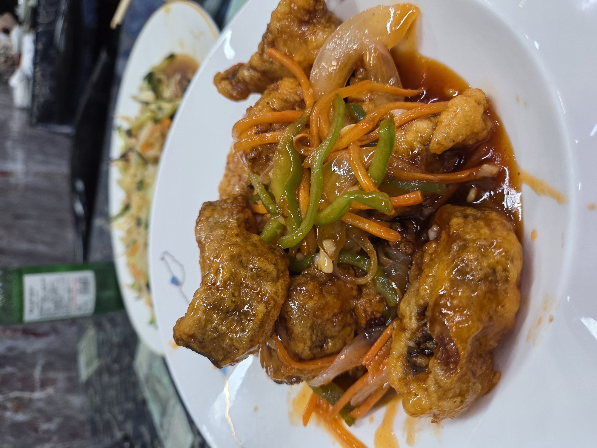 Restaurant meal featuring Asian dishes documented by witness