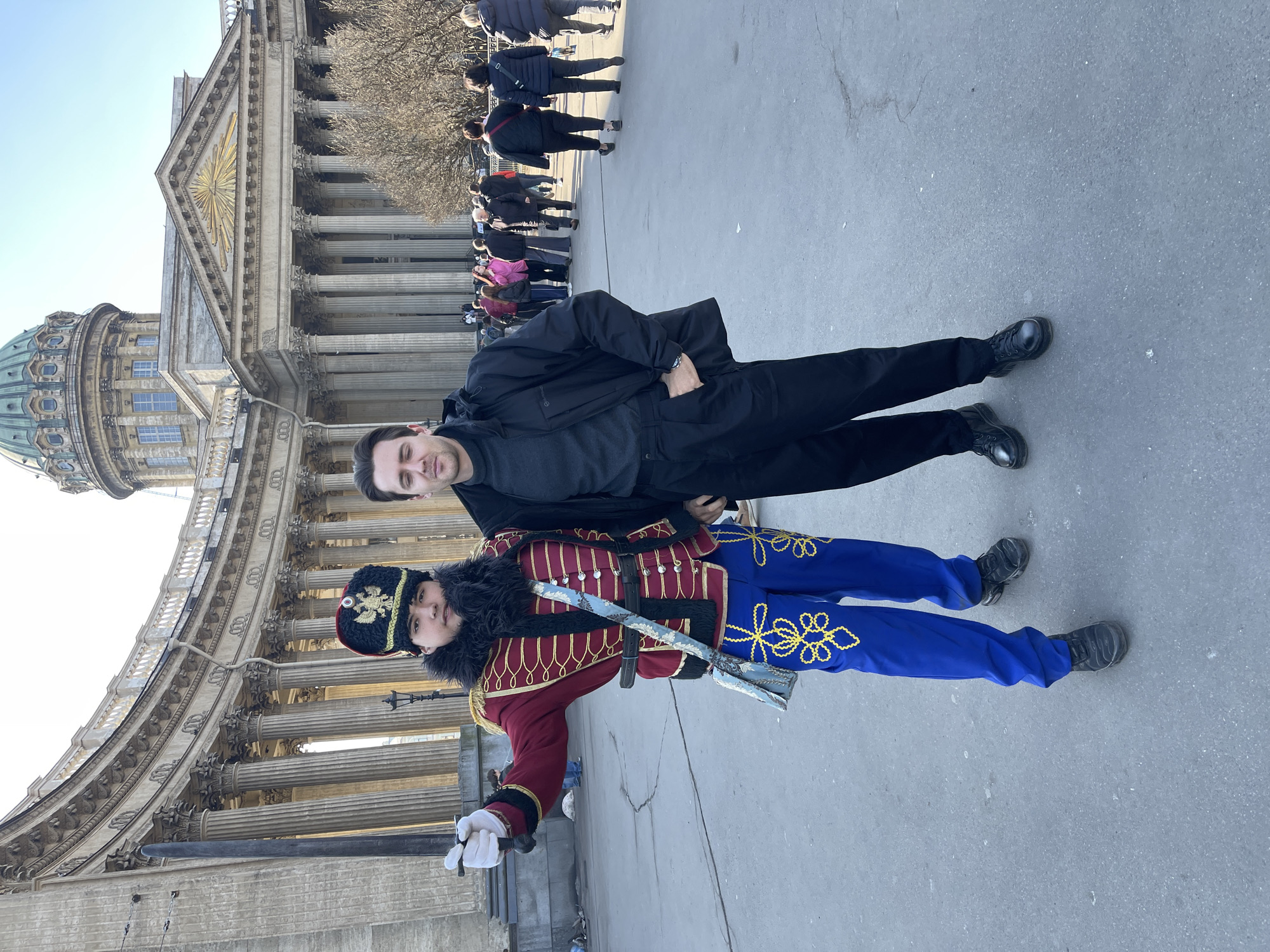 Tourists photograph costumed performers, landmarks in Saint Petersburg