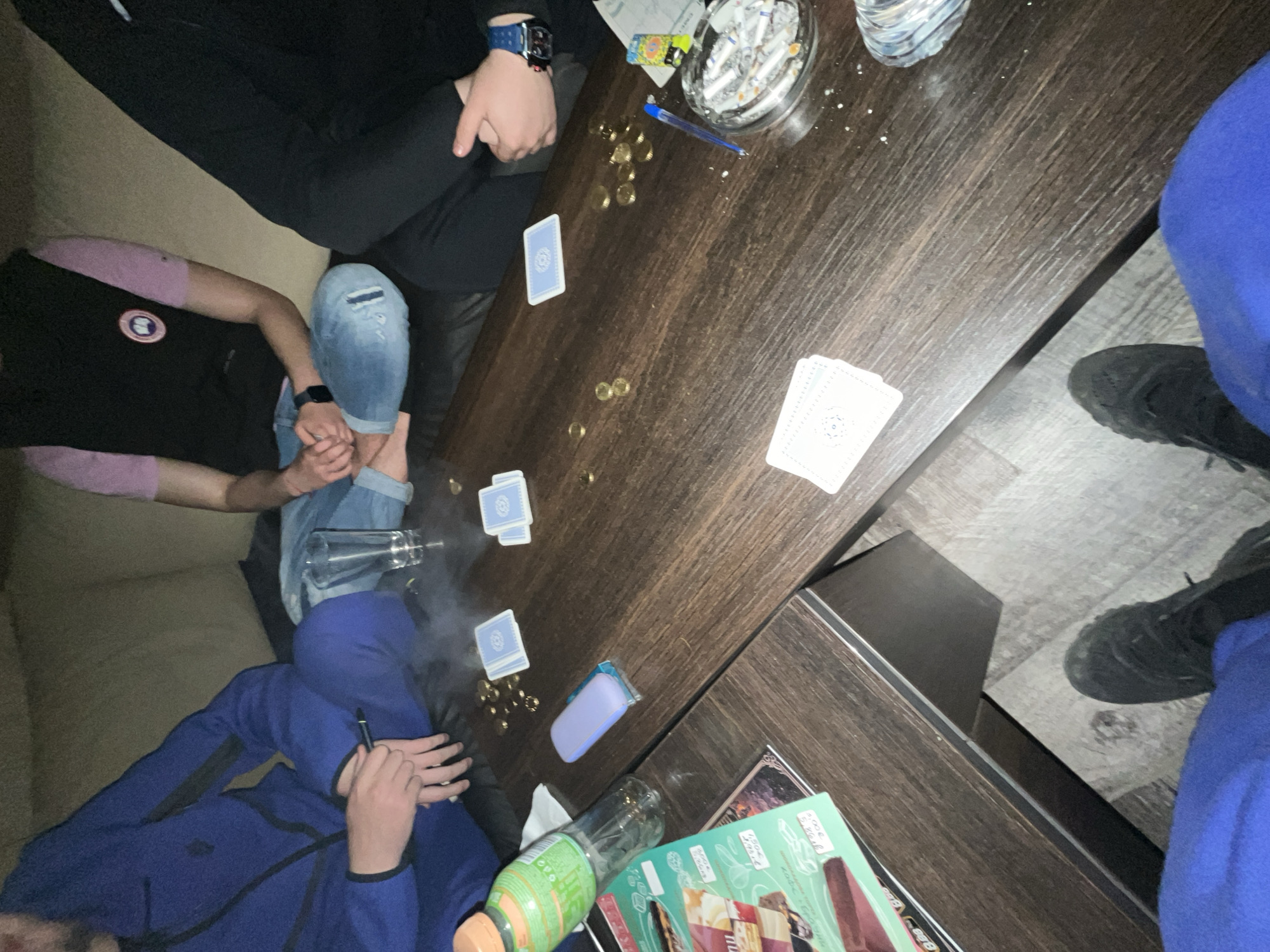 Four people gathered indoors in Svishtov, Bulgaria