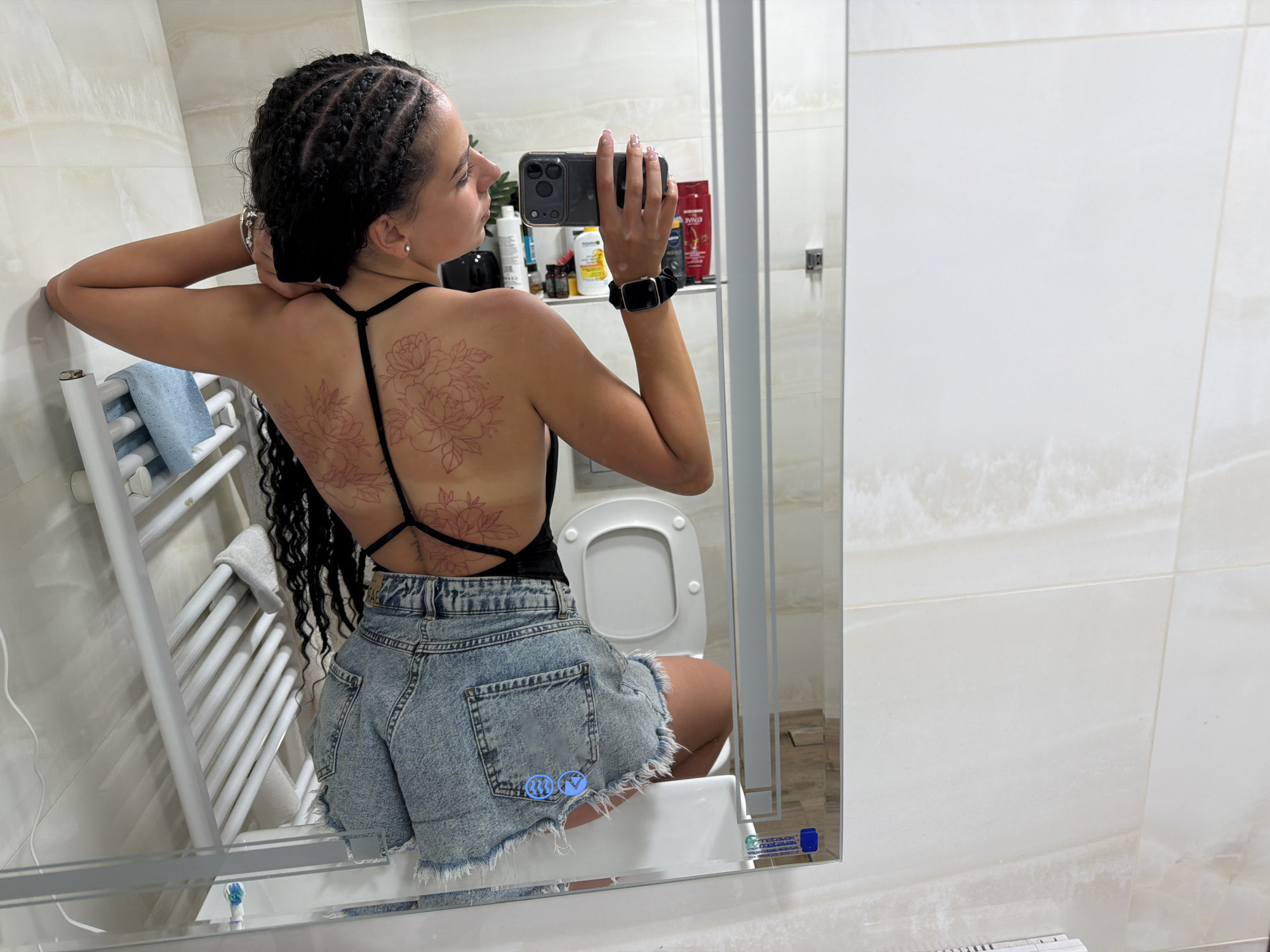 Gabrovo evening: bathroom selfies, a black cat, and sunset views