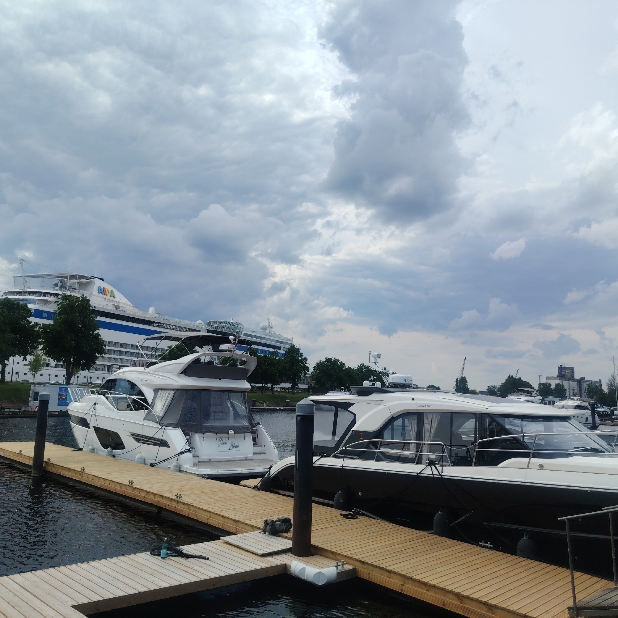 Cruise ships and luxury yachts dock in Riga harbor