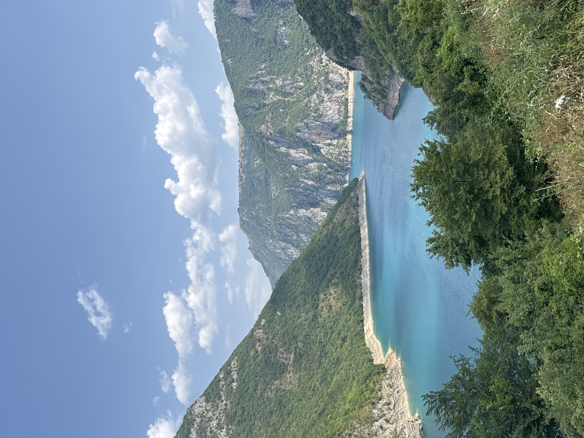 A morning on Piva Lake — boats, zip-lines, and canyon views