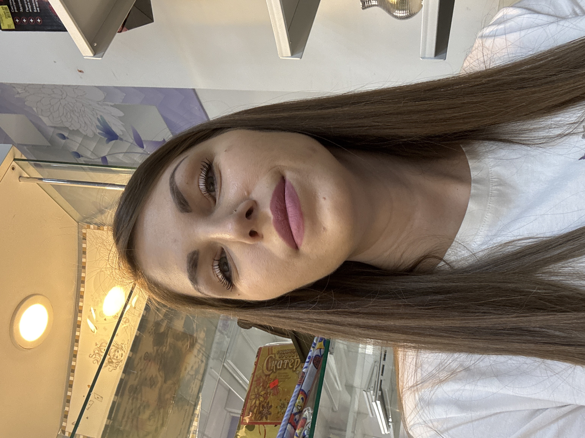 Woman photographed with tulips in Klin store early morning