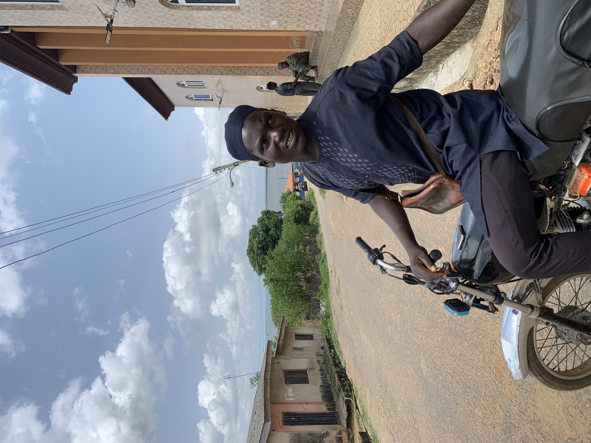 Motorcyclist travels through Ikorodu streets in traditional attire