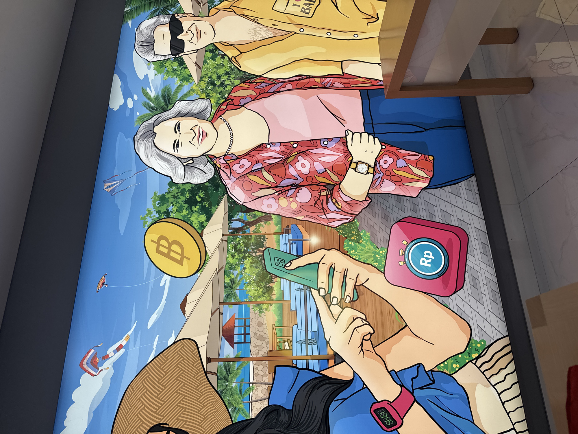 Cartoon mural with smartphone-holding figure spotted in Denpasar