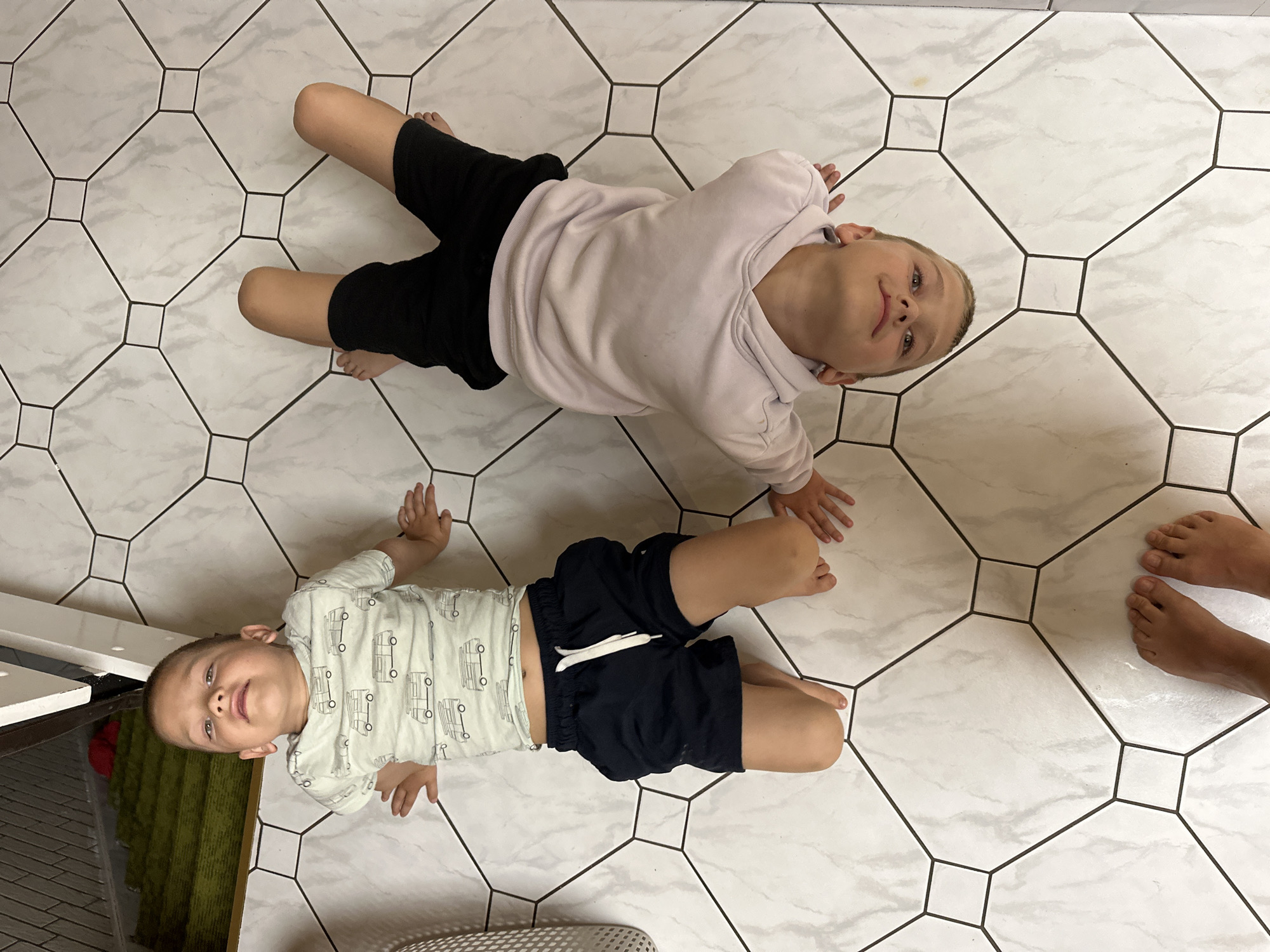Family yoga and play session documented in Fredenbeck home