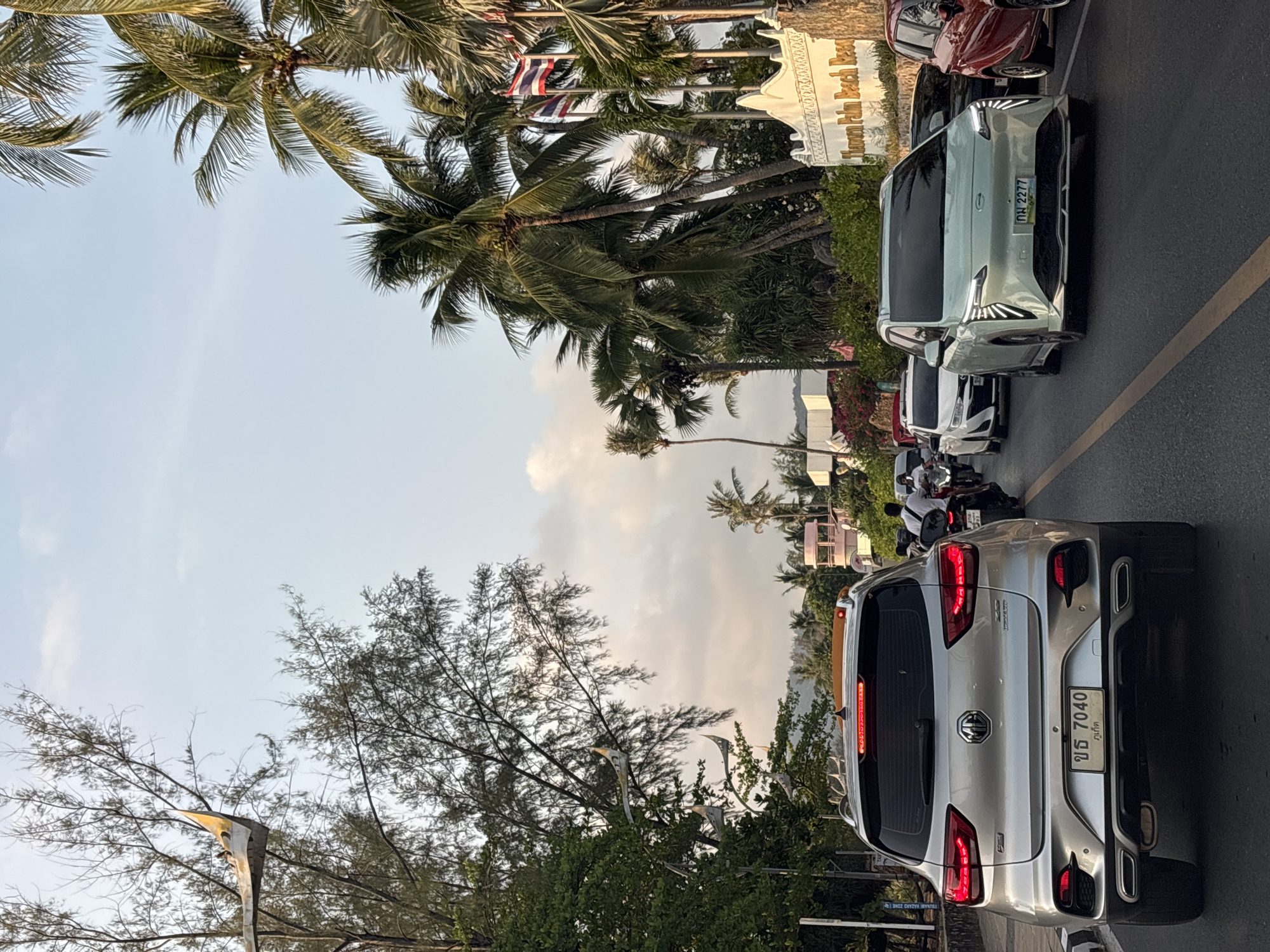 Silver MG vehicle spotted with lights on in Karon, Thailand