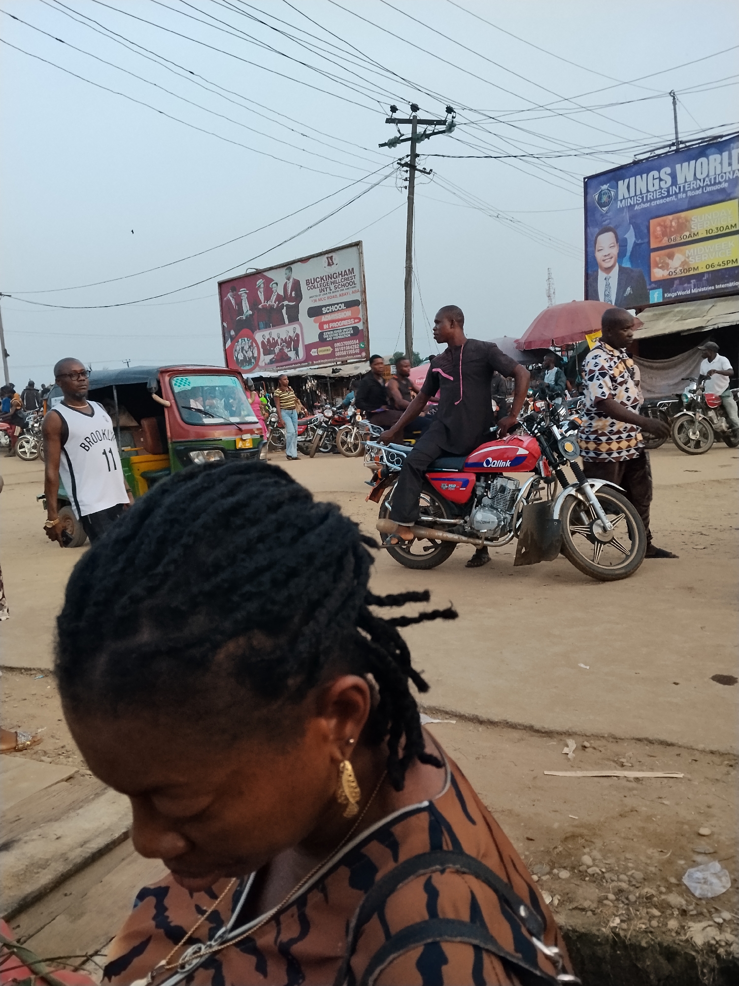 Daily life documented in Nigerian street markets and neighborhoods