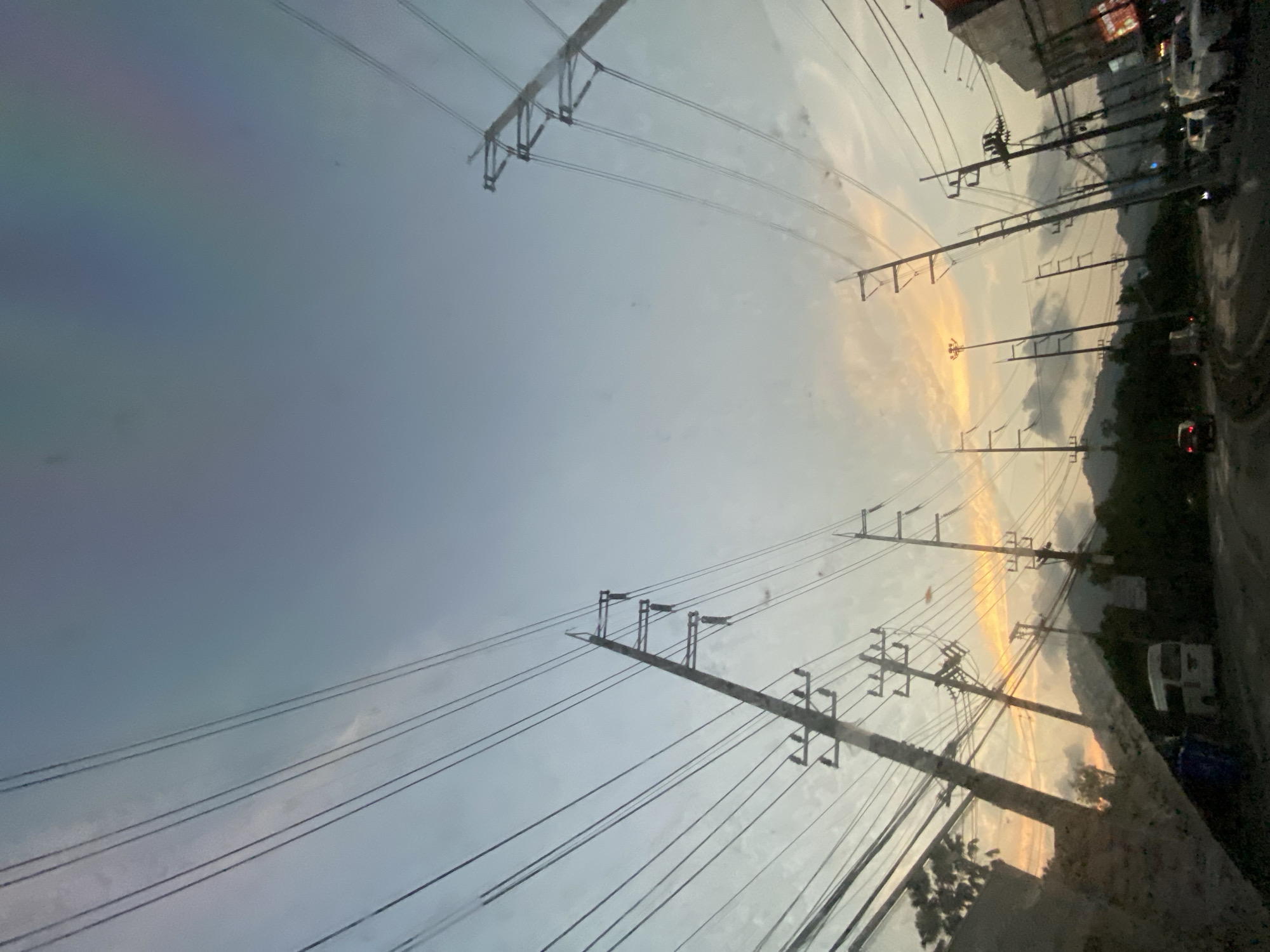 Sunset street scene documented in Kathu, Thailand