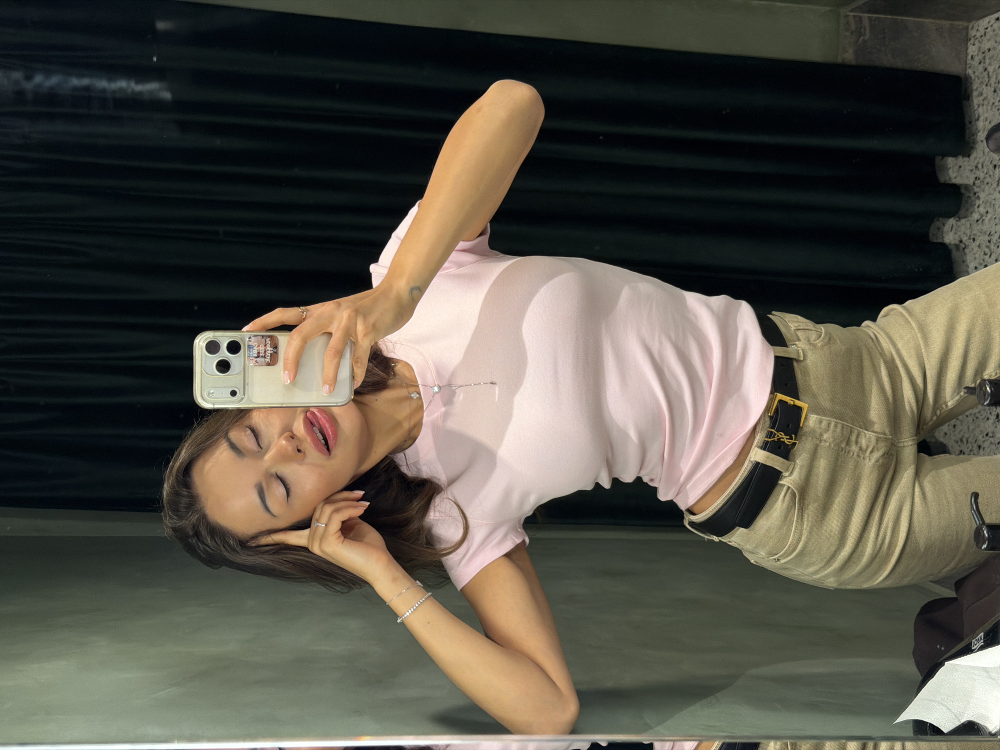 Woman takes selfies during shopping trip in Saint Petersburg