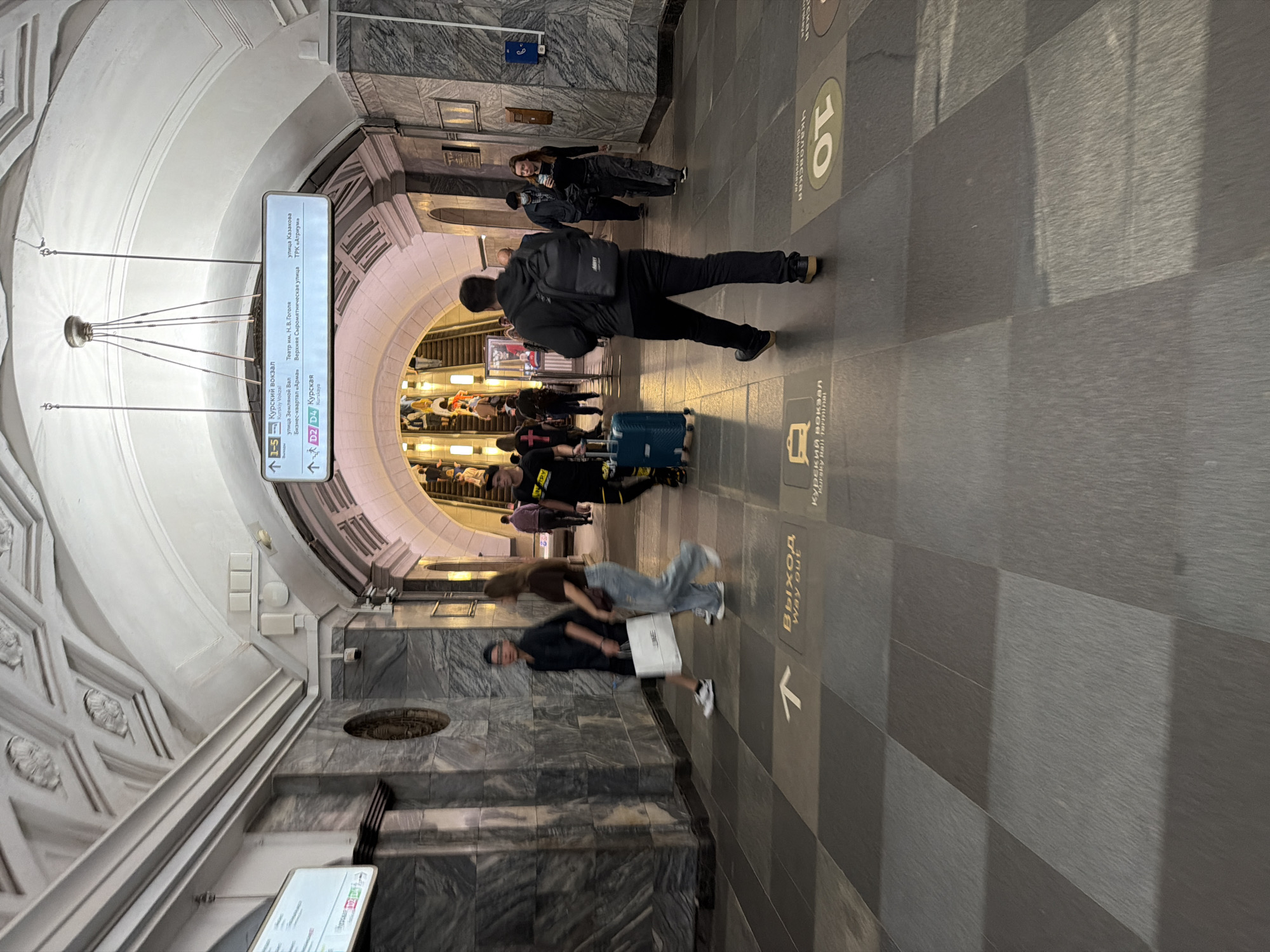 Inside and outside Moscow's metro on a July afternoon