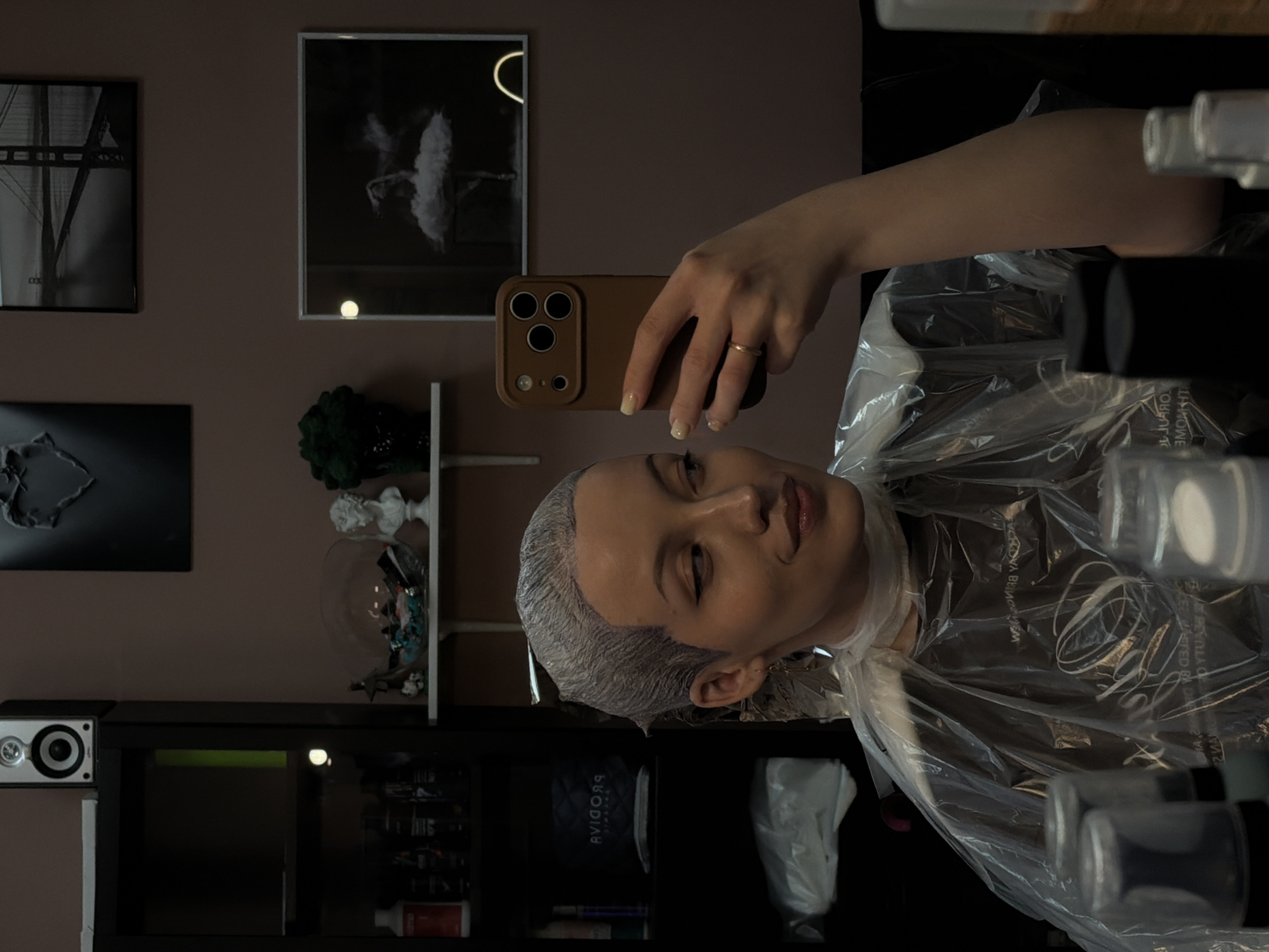 Woman documents hair salon visit with selfies in Klin