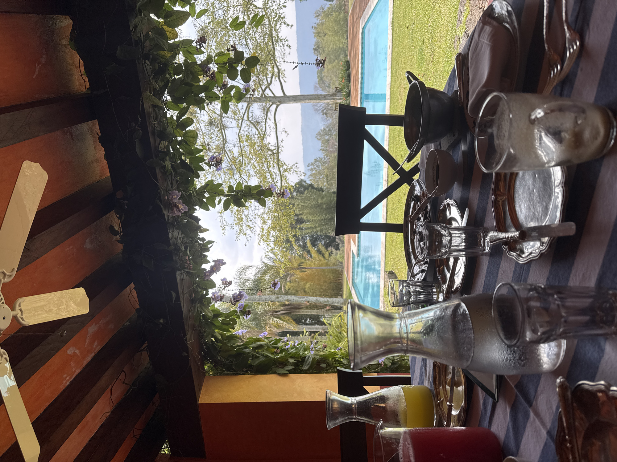 Poolside breakfast setting observed in San Pablo Coapan, Mexico