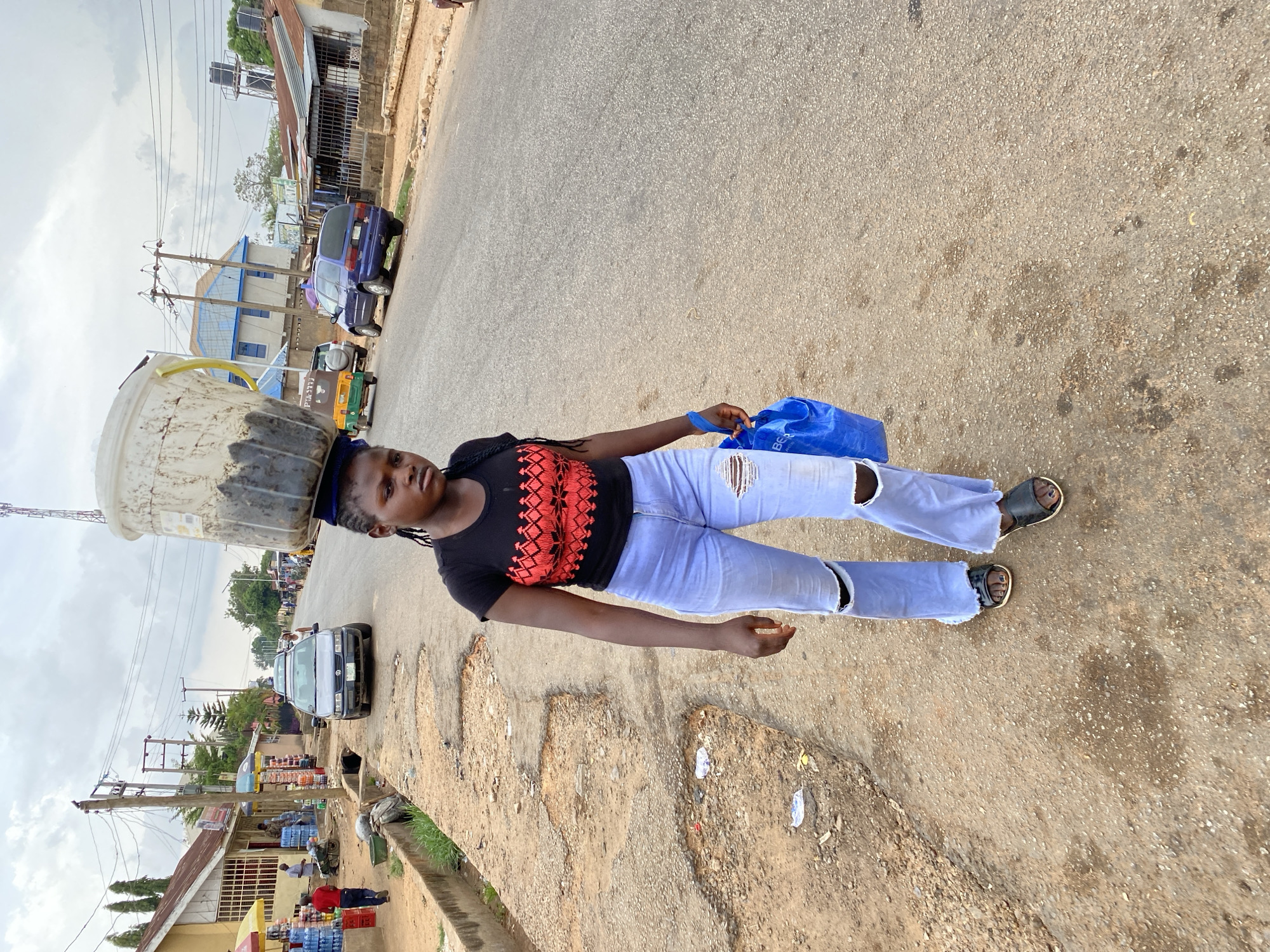 Afternoon street life documented across Bukuru, Nigeria neighborhoods