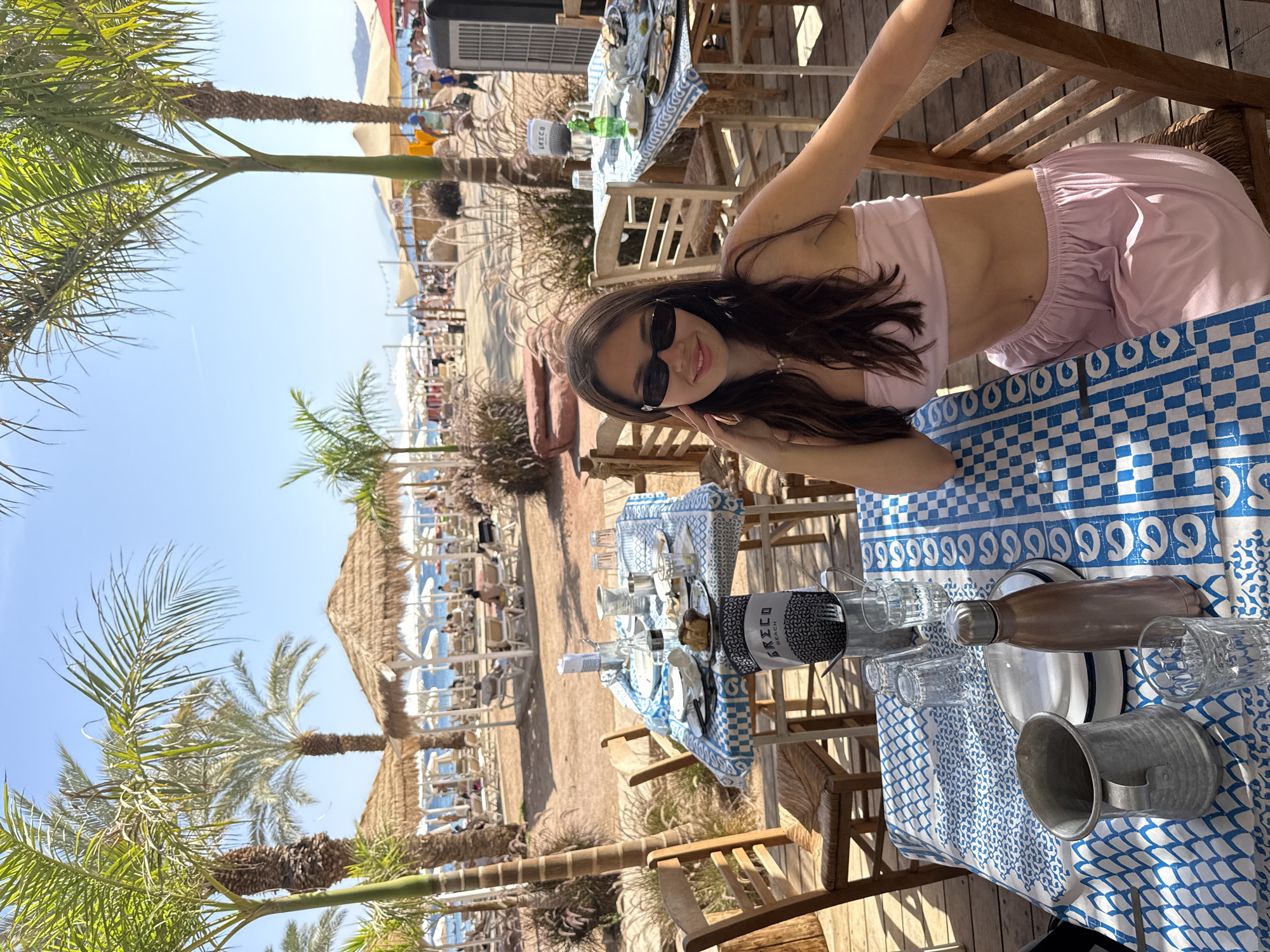 Couple enjoys beachside lunch and beer toast in Eilat