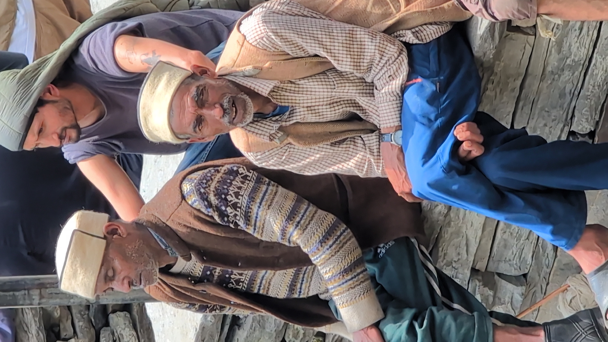 Village gathering in Malana's courtyard, likely a local festival