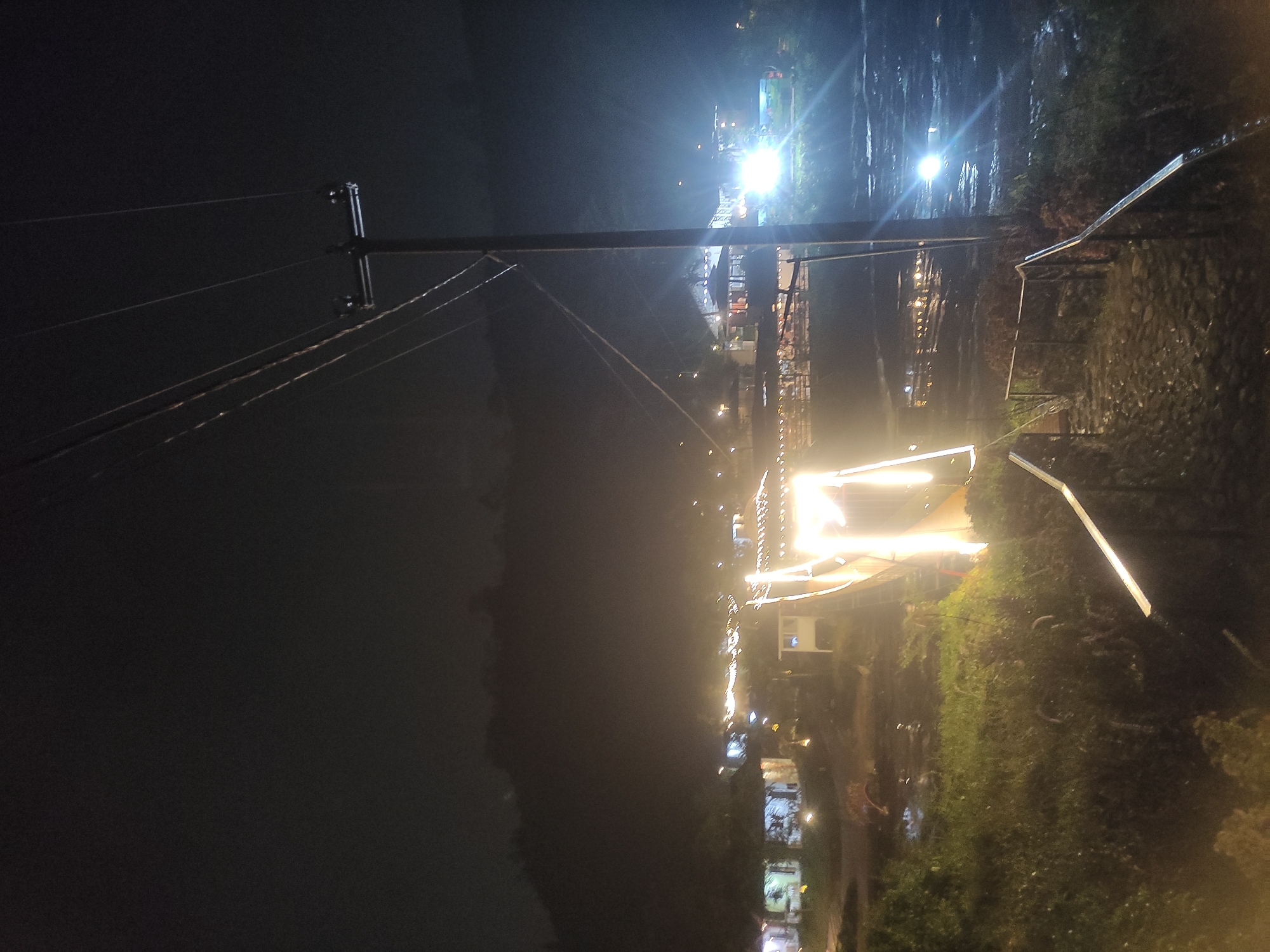Evening dining and bridge walk documented in Babakan Madang