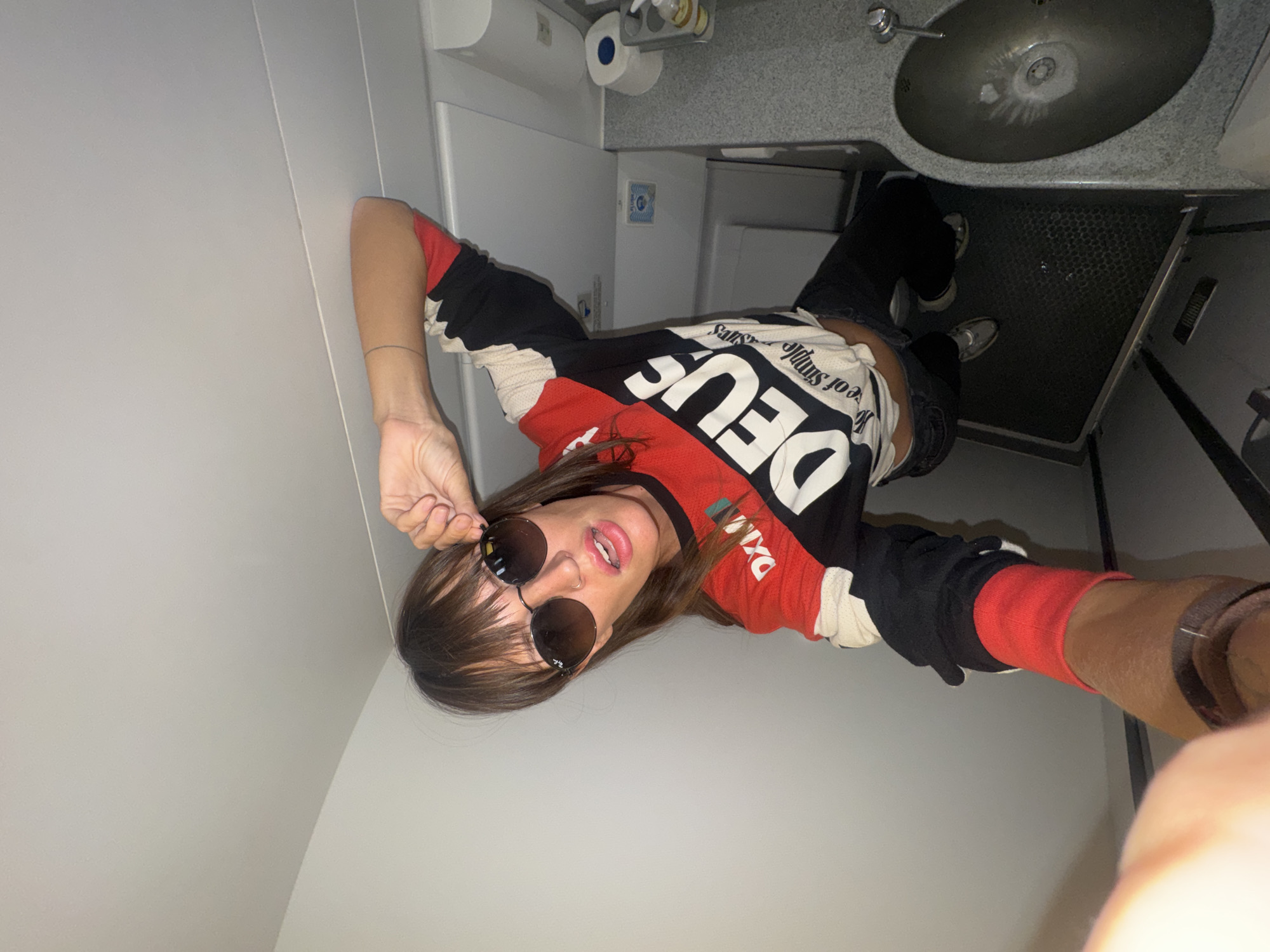 Woman Takes Airplane Bathroom Selfies During Kuta Flight