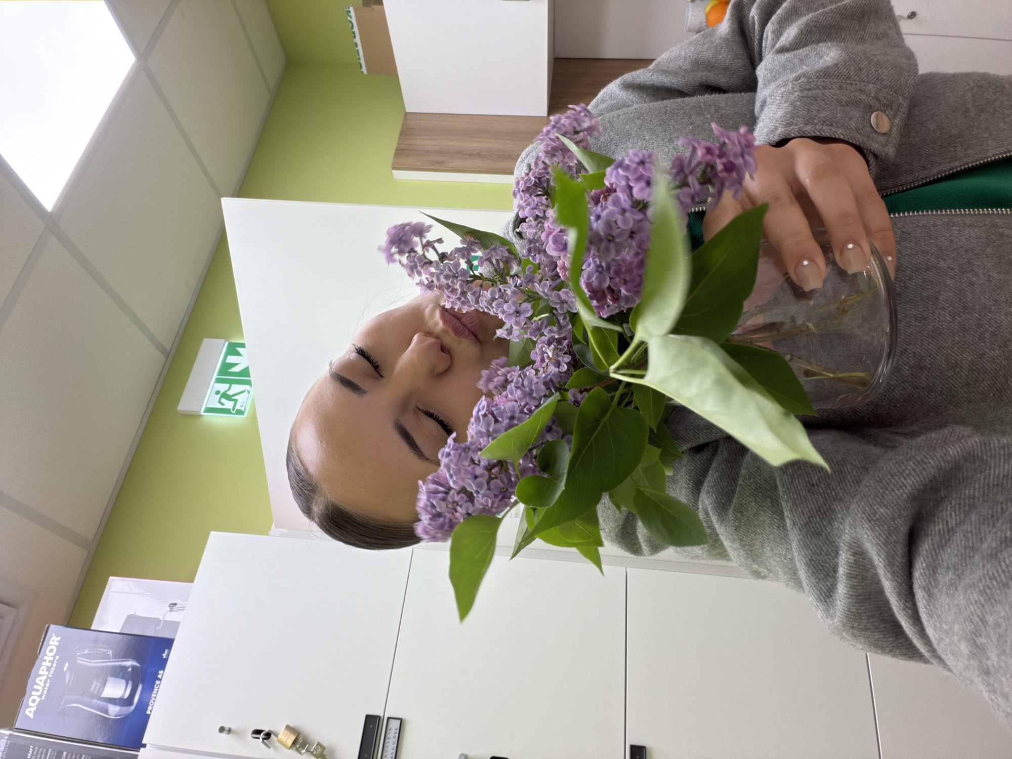 Woman with lilac bouquet spotted across multiple Sofia locations