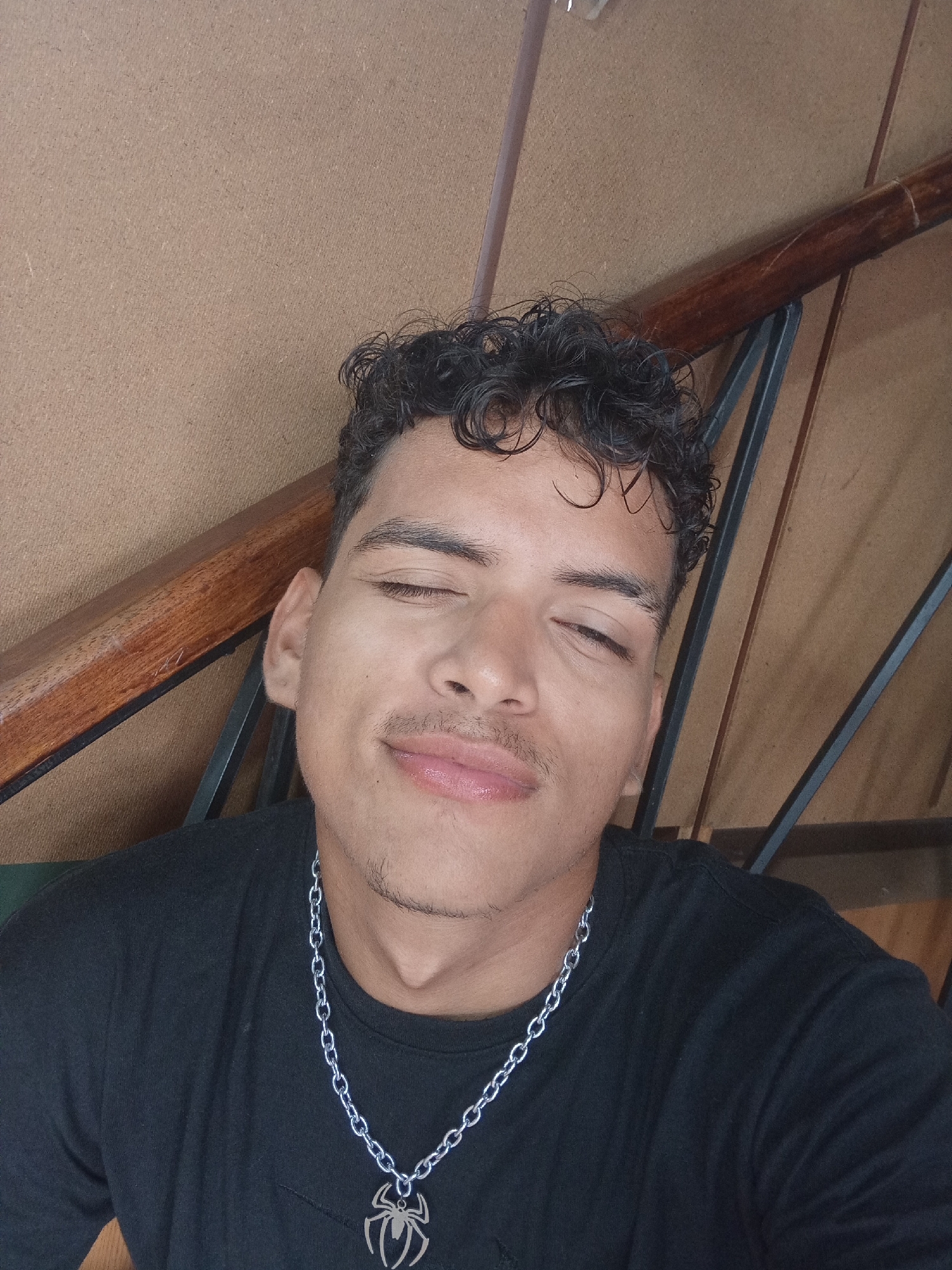 Man takes indoor selfies in Juan Griego, Venezuela