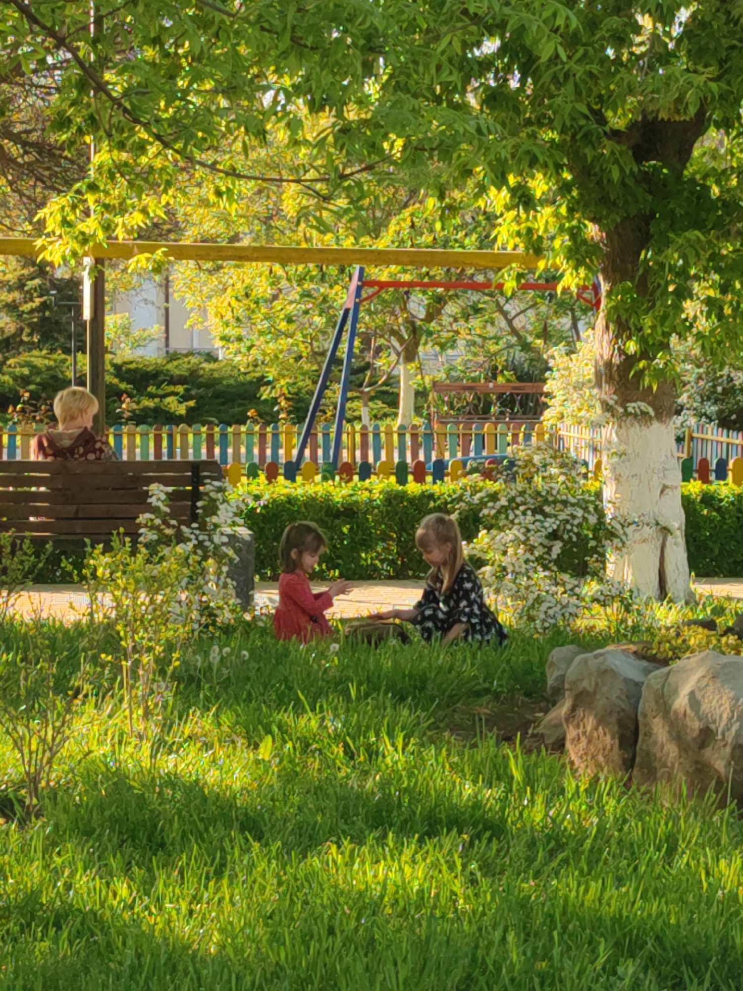 Children play near Cossack monument in Sennoy park