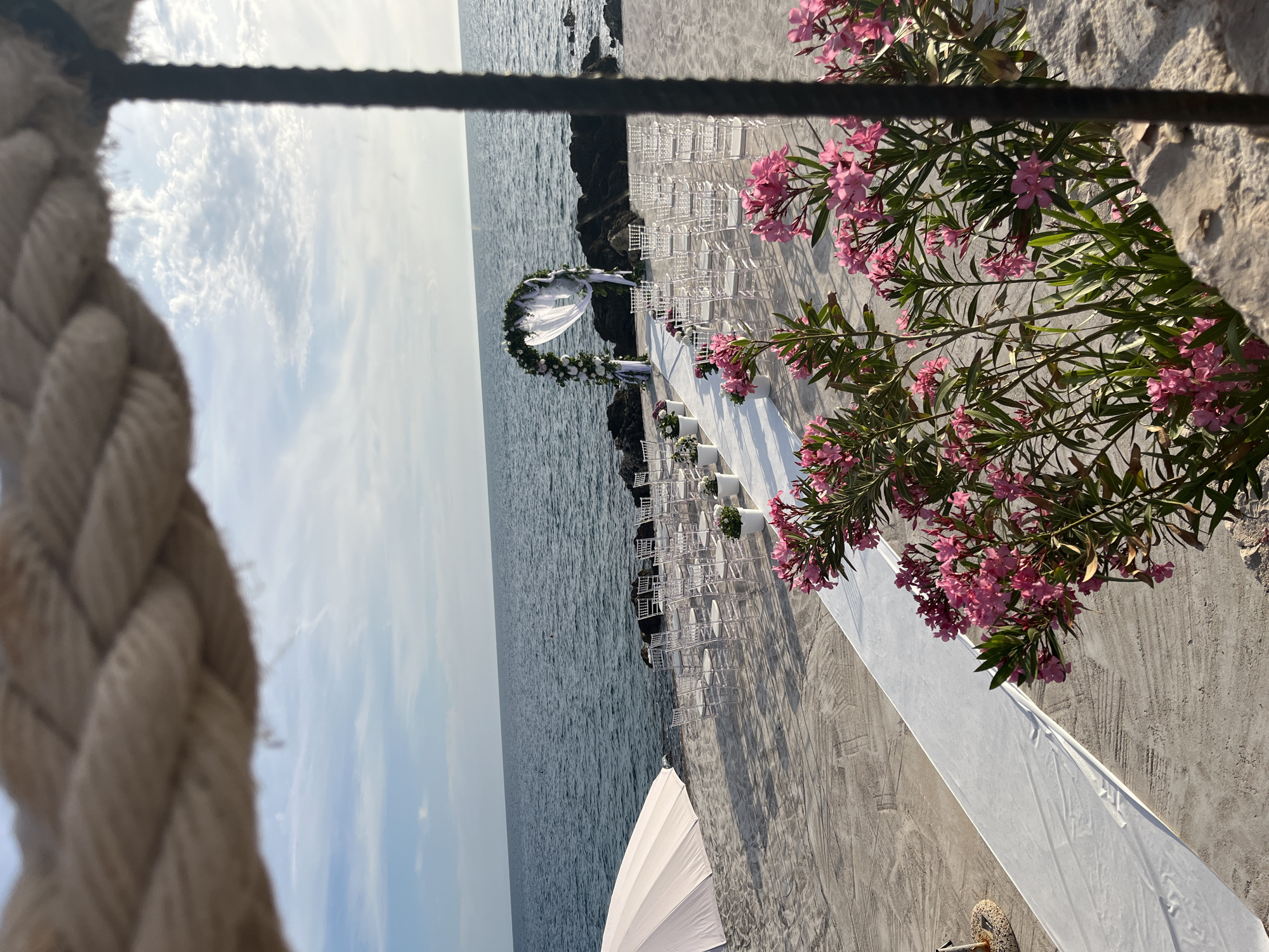 Beachfront wedding ceremony held at sunset in Kunje, Montenegro