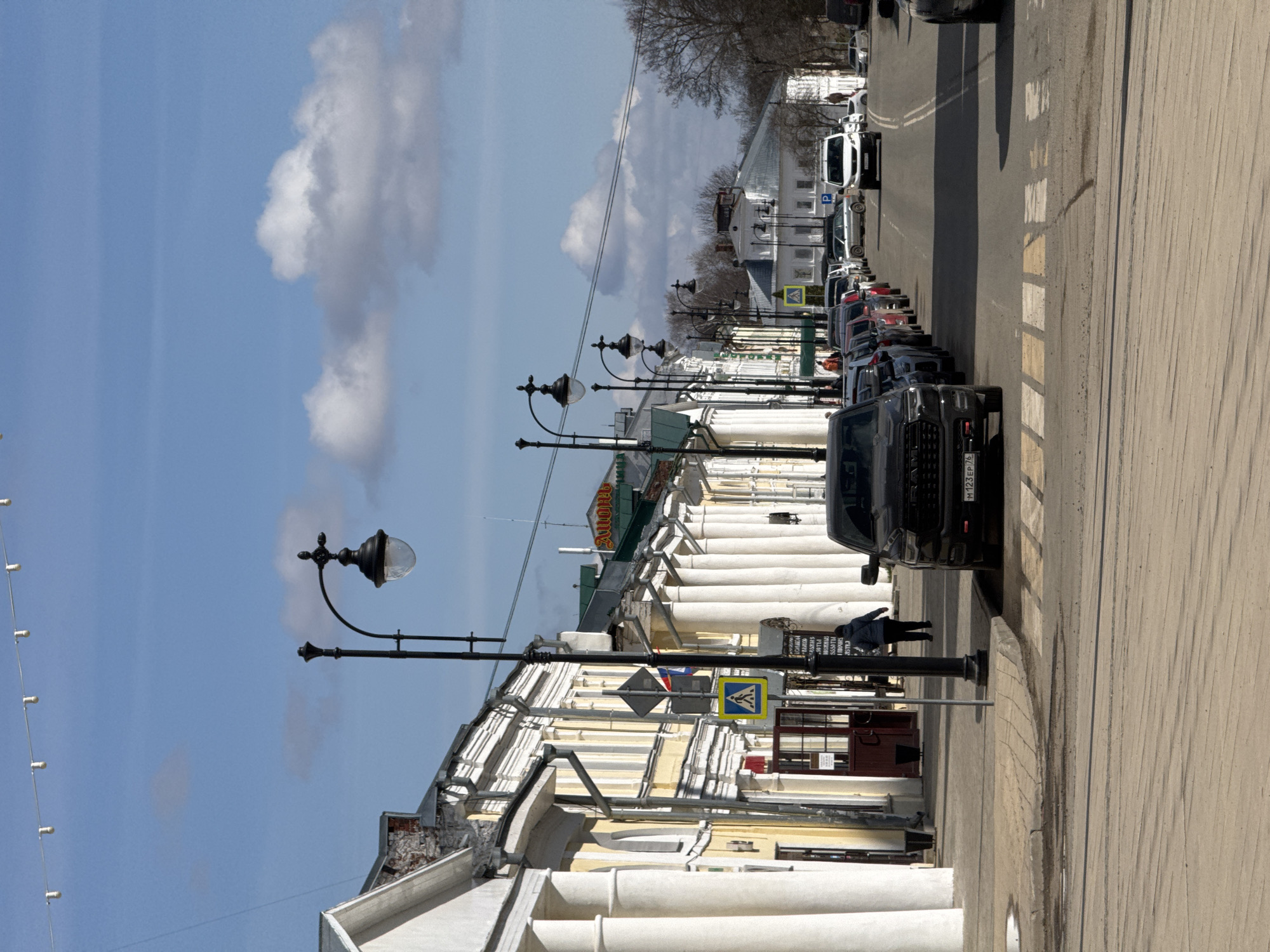 Urban street scenes documented showing mixed architecture, signage