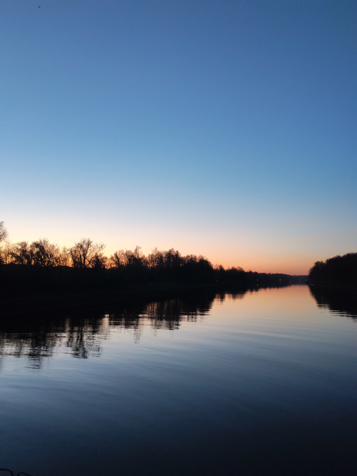 River cruise ships navigate Yakhroma waterways during evening hours