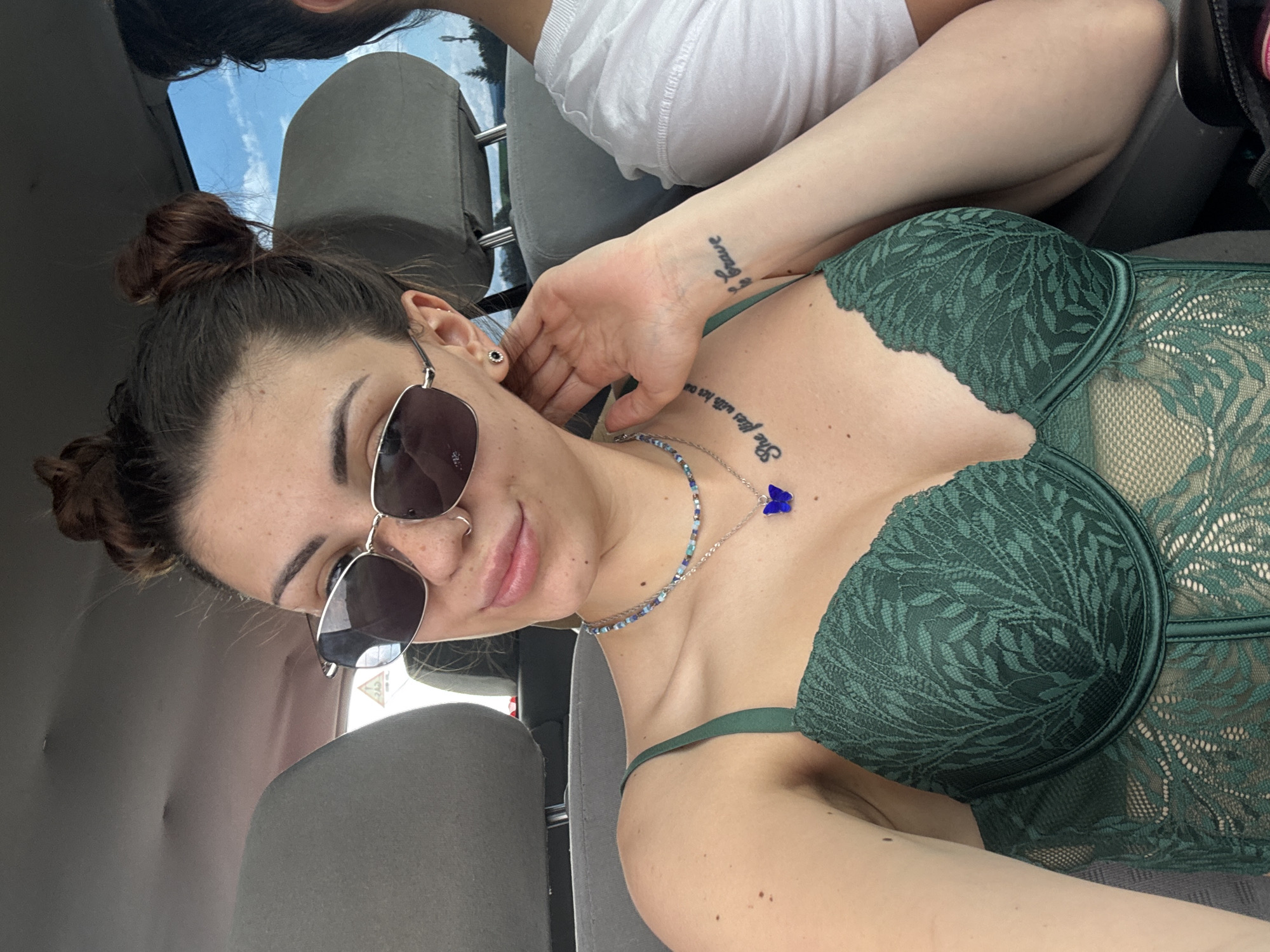 Woman poses for photos inside car in Gorna Malina