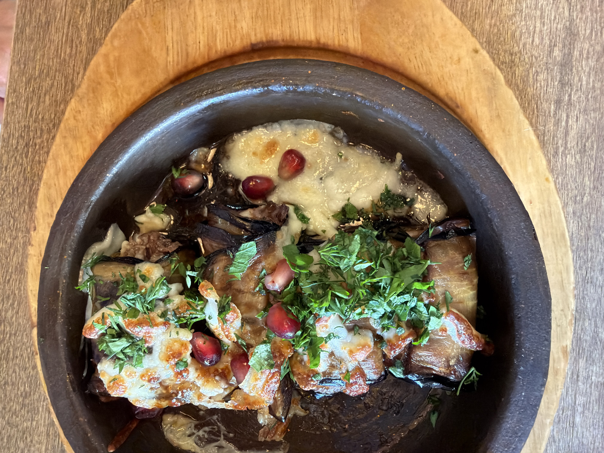 Lunch at an Izhevsk restaurant with eggplant dishes and wine